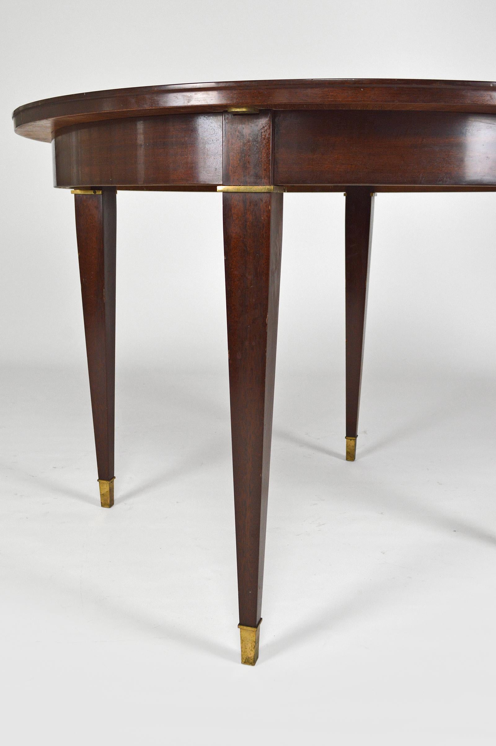 Veneer Art Deco Mahogany Round Table with Extensions, by Jacques Adnet, circa 1940 For Sale