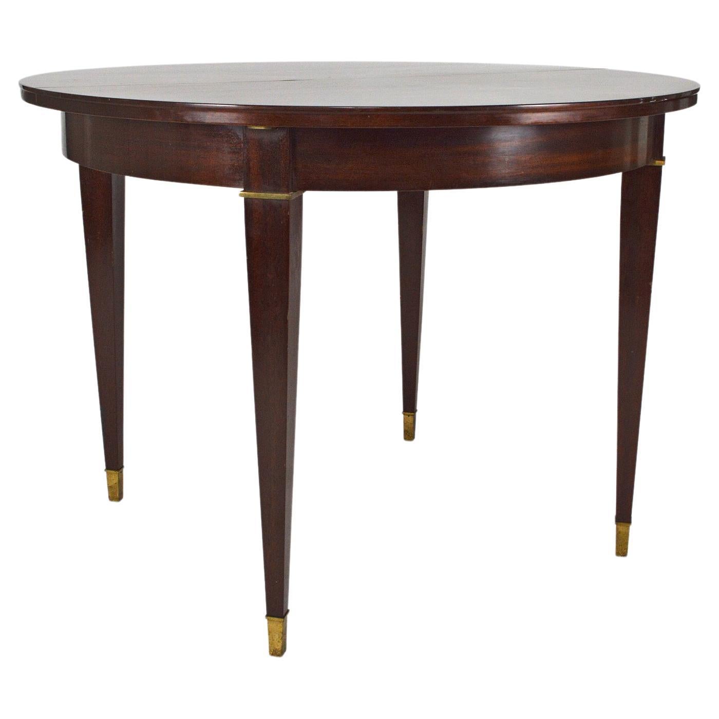 Art Deco Mahogany Round Table with Extensions, by Jacques Adnet, circa 1940 For Sale