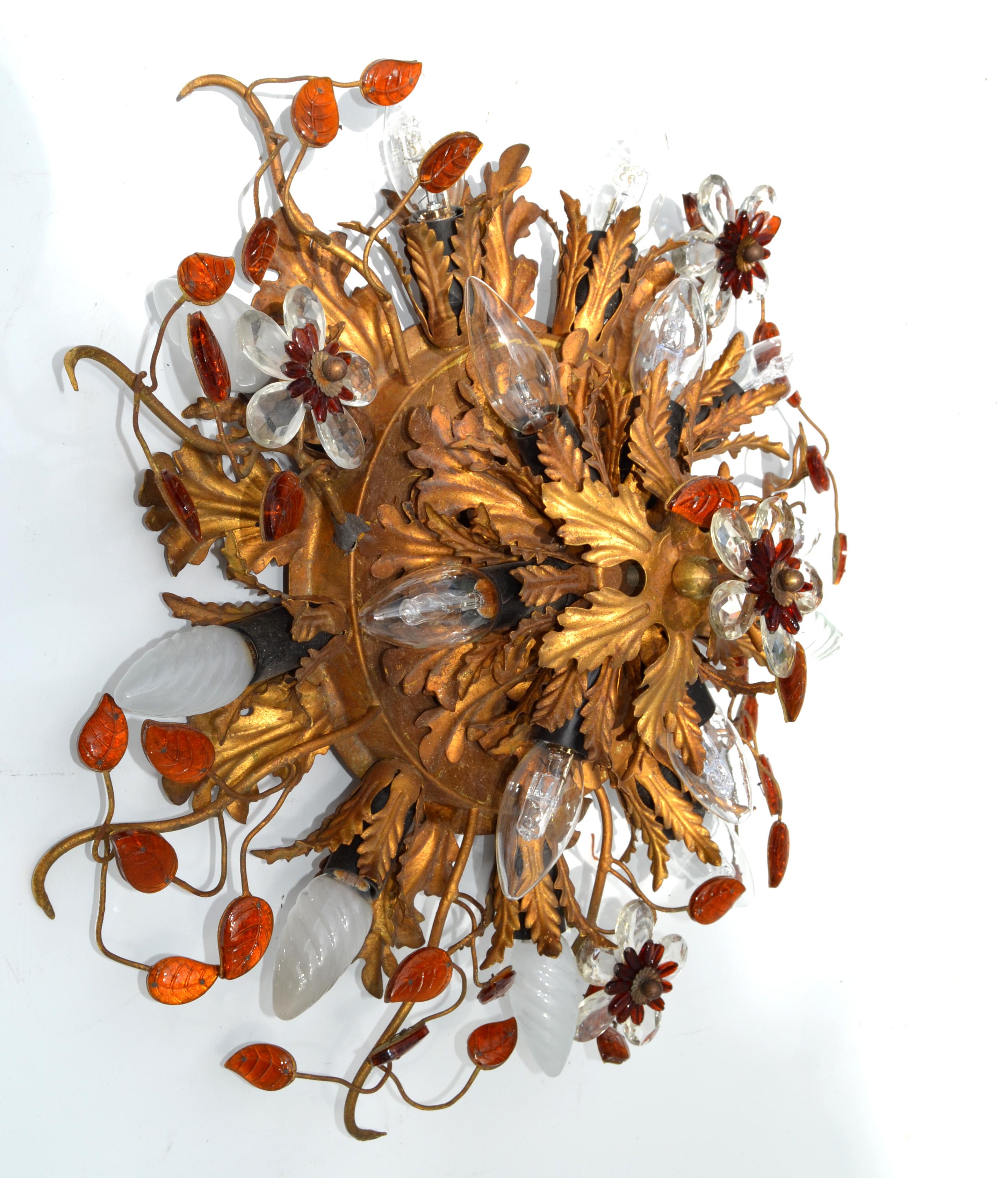 Superb Maison Baguès 2 tier flush mount or sconces, gilded metal and colored faceted glass ornamentation. 
Original French Wiring and it takes 15 light bulbs E14, 40 watts max per bulb. 
In fair vintage condition with some losses to the branches