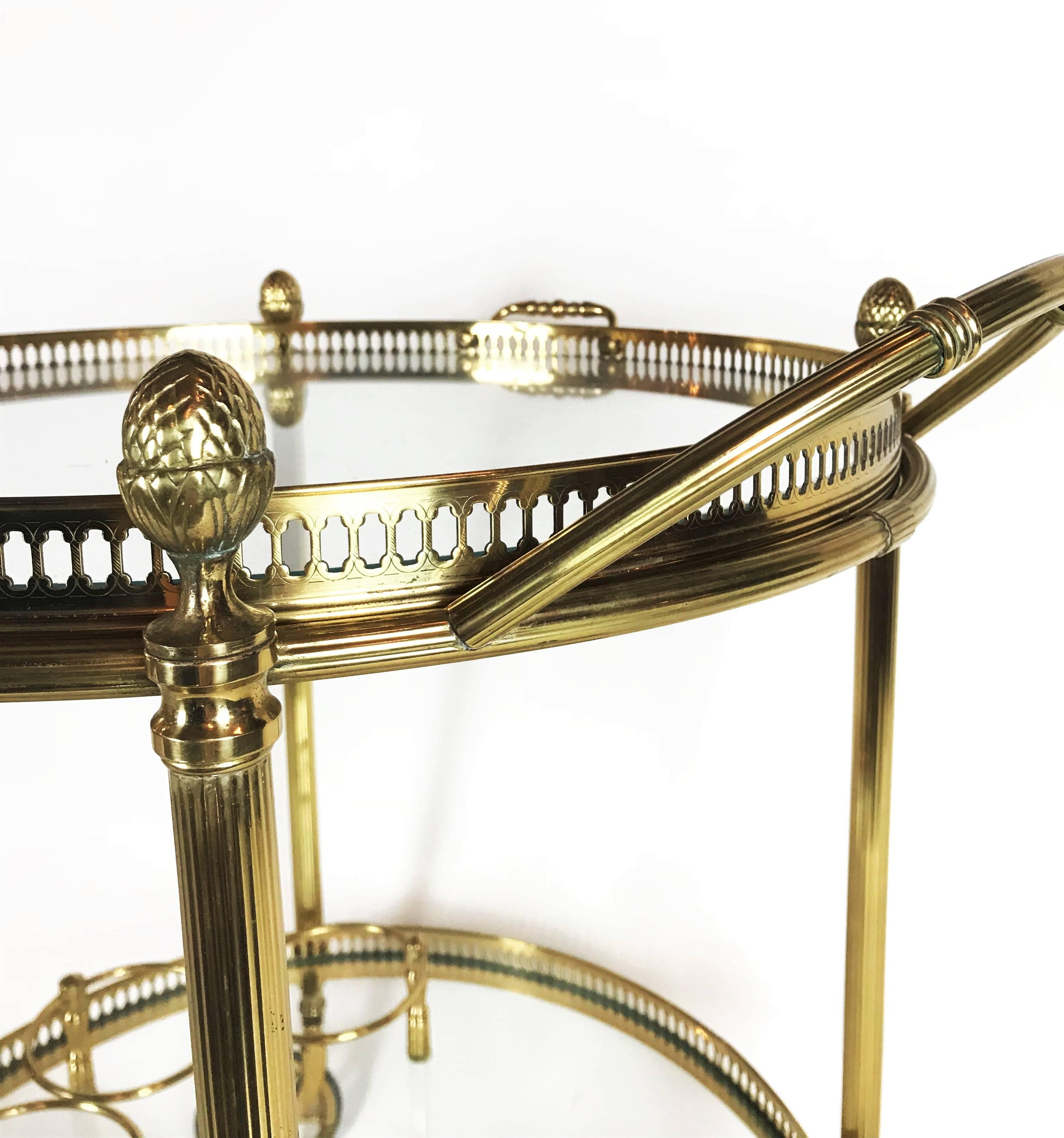 Neoclassical serving table in heavy gilt brass by Maison Baguès Paris. Maison Baguès is renowned for fine brass objects and lights since its establishment in 1860 the idiosyncratic genius Armand-Albert Rateau used Maison Baguès accessories to