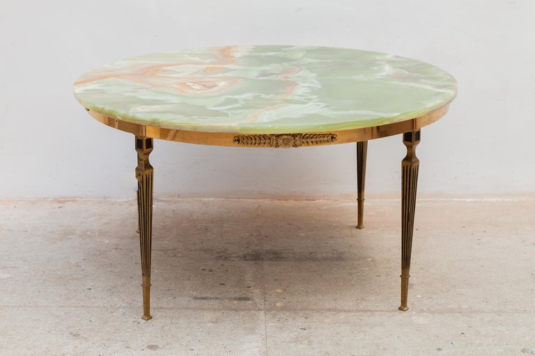 Art Deco Maison Jansen coffee, cocktail -table in bronze and very nice bronze floral details, round green marble top with orange veins, circa 1940s, France.
Dimensions : W 90cm, H 47 cm. In original very good condition.