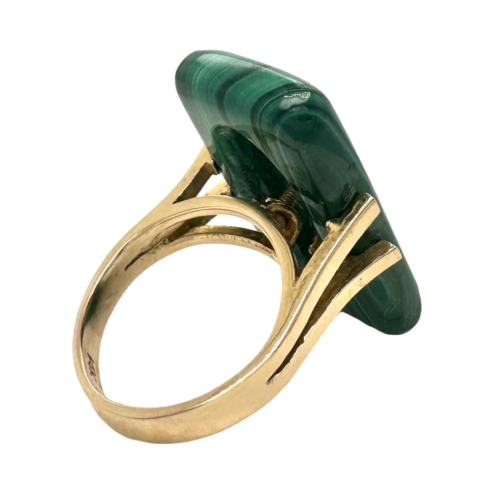 Style: Art Deco 
Material: Yellow Gold
Metal Purity: 14k
Stones: Diamonds, Malachite
Measurement: 1 inch x 0.5 inchesE
Ring Size: 5.75 (US) - can be sized