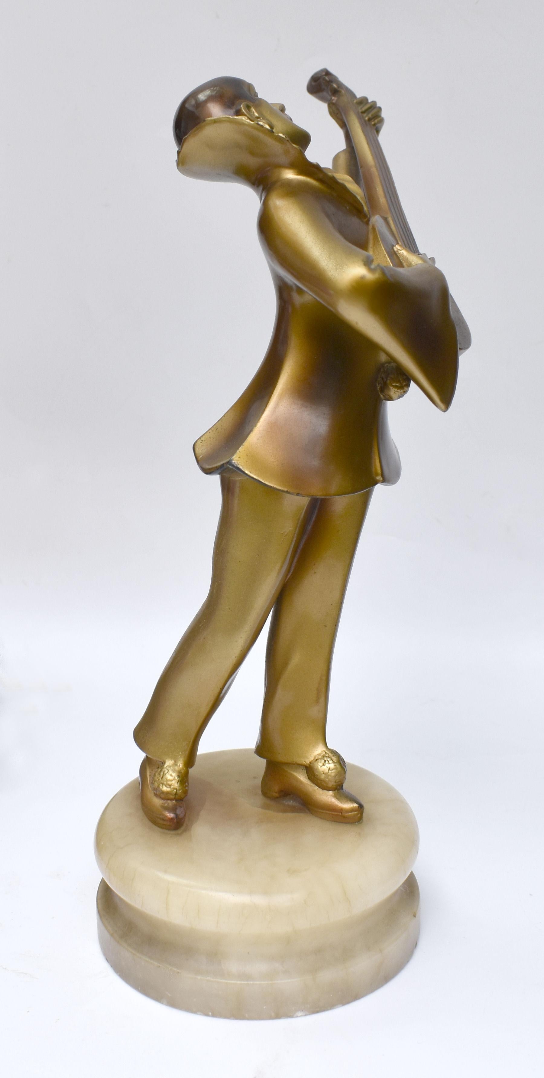 For your consideration is this unsigned Lorenzl cold painted spelter figure, dating to the 1930's depicting a Mandolin player mounted on a alabaster base. Condition is very good, no damage or restoration, lovely item and perfect to add to