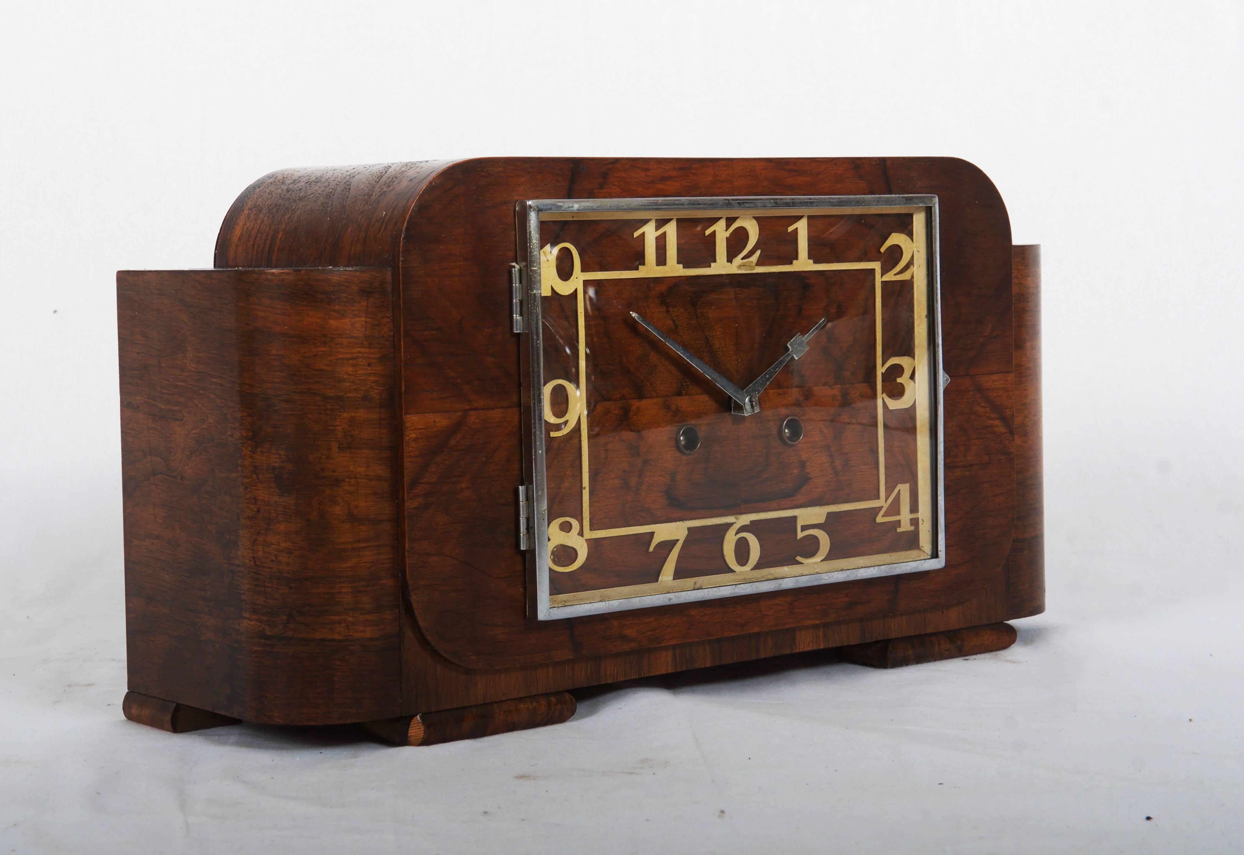 Softwood covered with a walnut veneer made in Germany by Junghans in the 1930s. 
Perfect original condition.
 