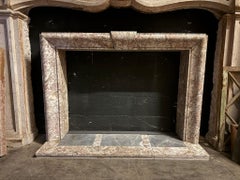 Art Deco mantle fireplace in Peach blossom marble, Italy