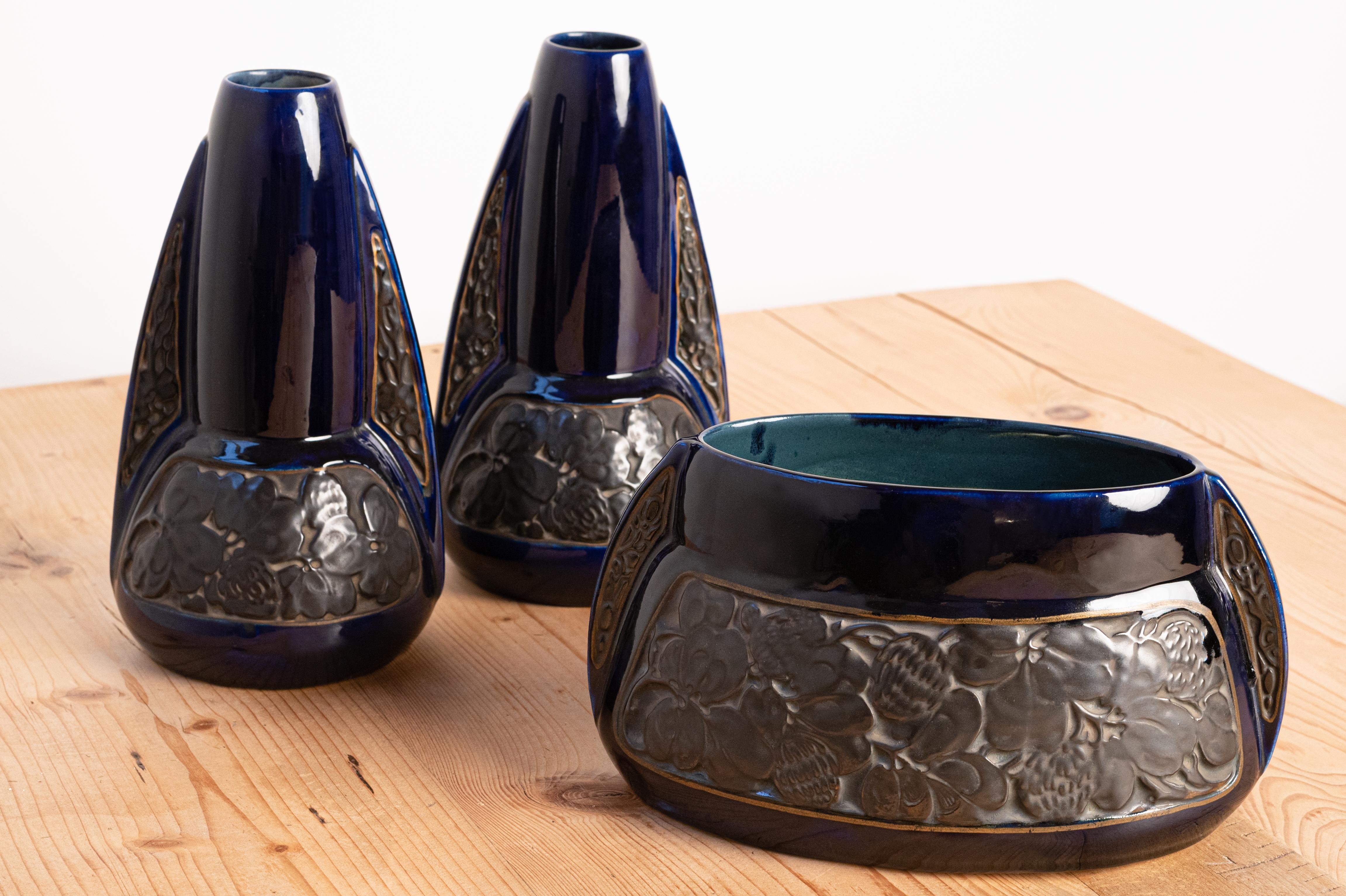 Art Deco Set of 3 mantlepiece objects, made by Manufacture de Gustave de Bruyn et fils (Fives-Lille), in the 1920/1930s. Ceramics in dark blue and matt black colour.