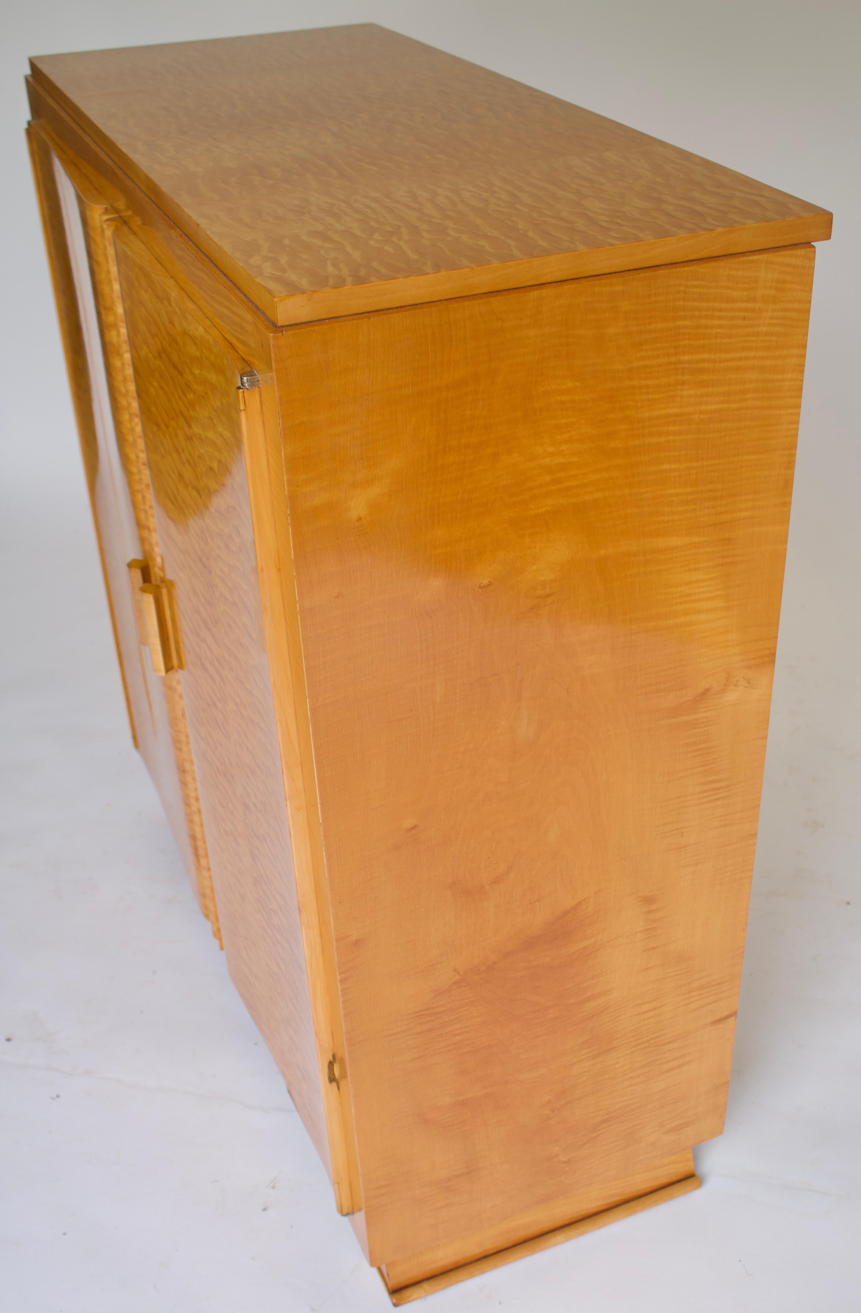 Polished Art Deco Maple 2 door side cabinet with fiited slide & shelves For Sale