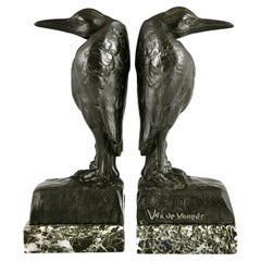 Fermalibri Art Deco in marabù di Georges Van De Voorde con marchio della fonderia 1925