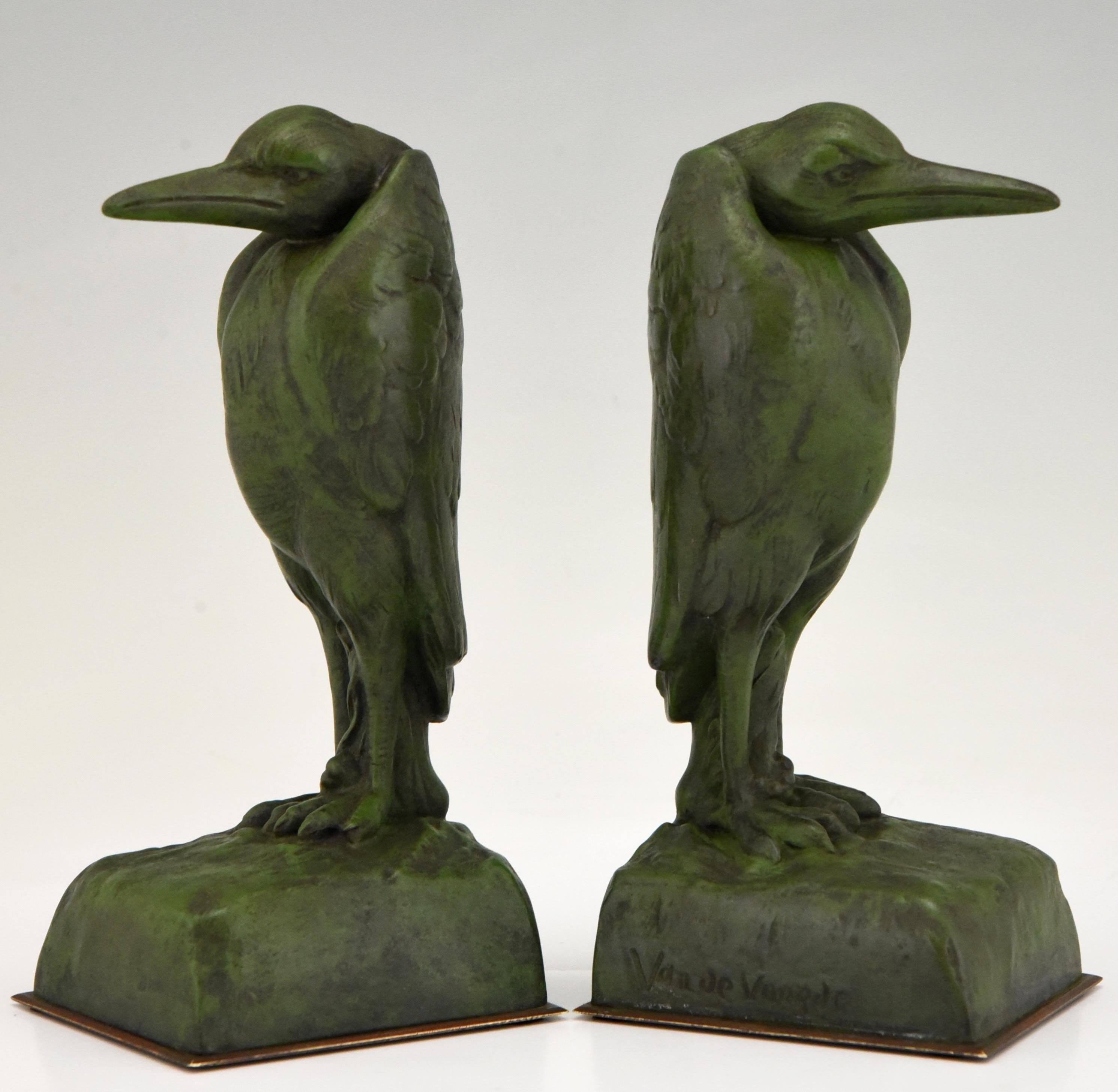 A nice pair of Art Deco Marabou bookends by Georges Van de Voorde,
Belgian artist born in 1878 worked in France. The bird sculptures are in Art Metal with a dark green patina.
Literature
These bookends are illustrated on page 328 of ? “Art Deco