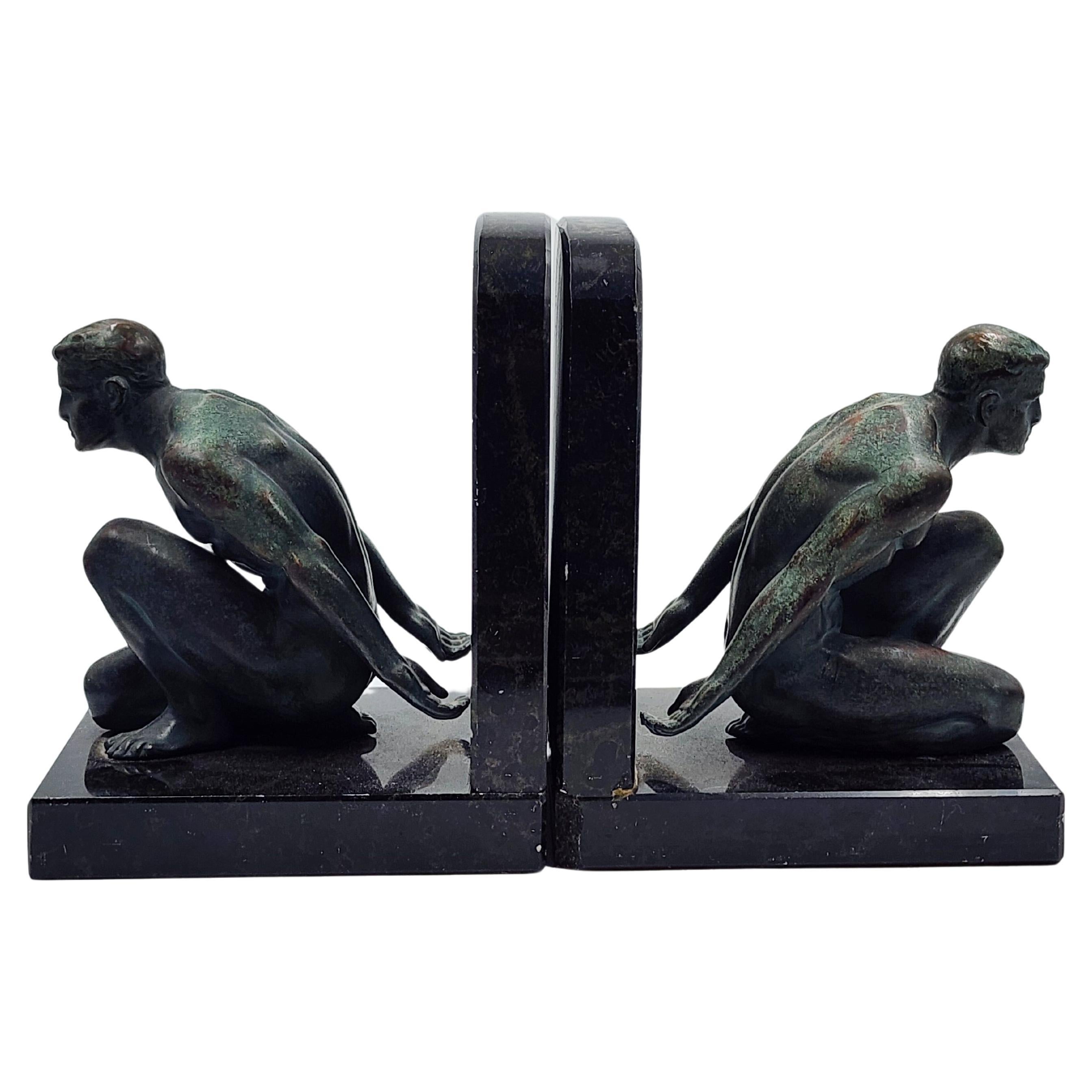 Art Deco marble and bronze bookends For Sale