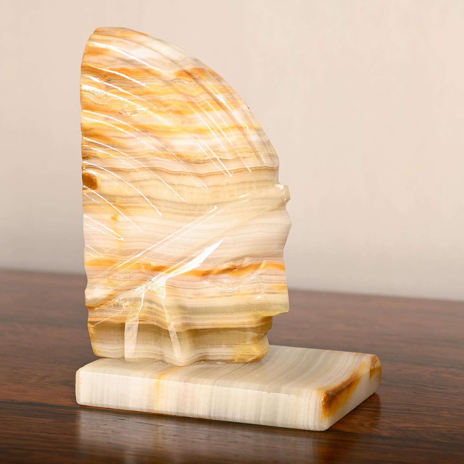 Art Deco marble bookends with carved heads of Native Americans 4