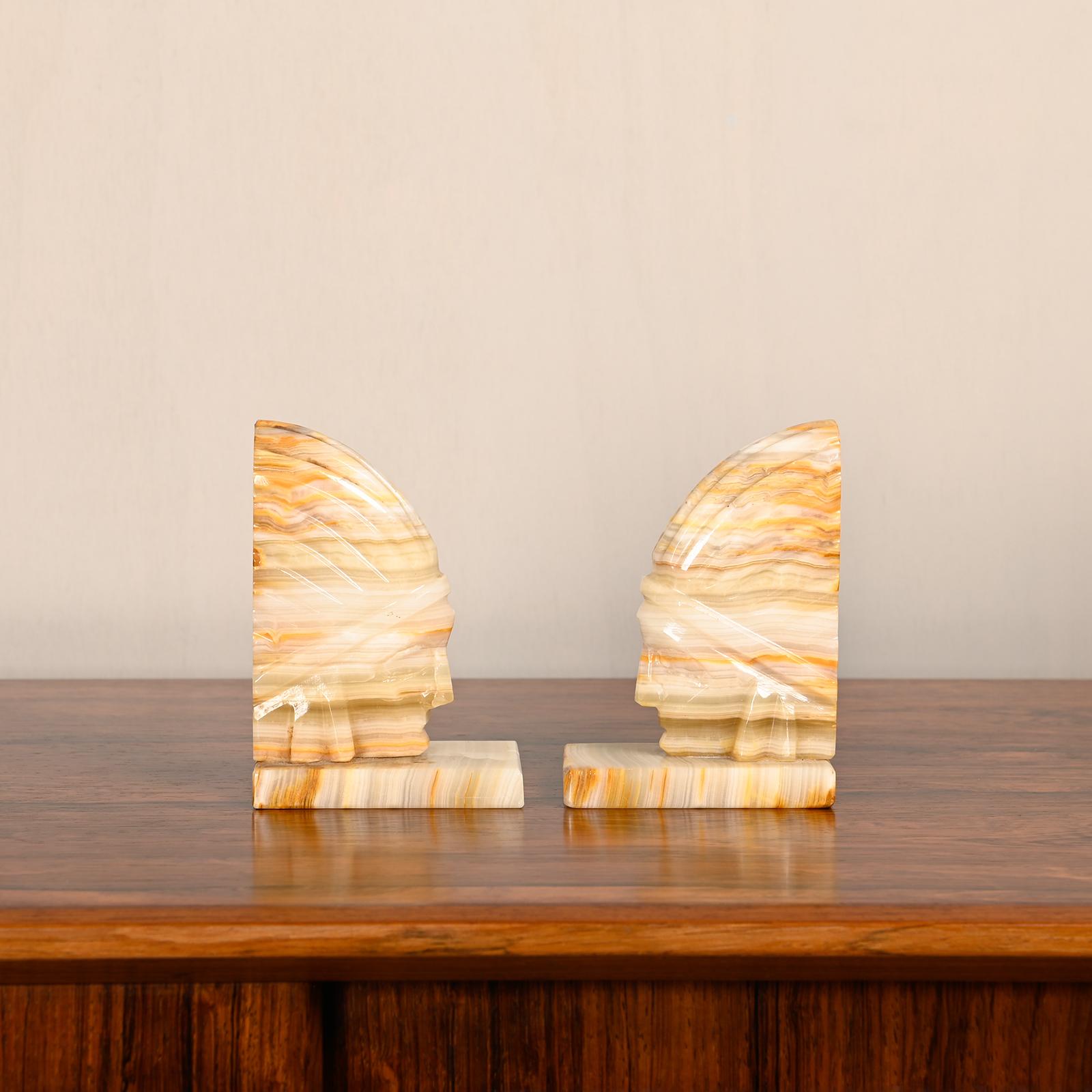 European Art Deco marble bookends with carved heads of Native Americans