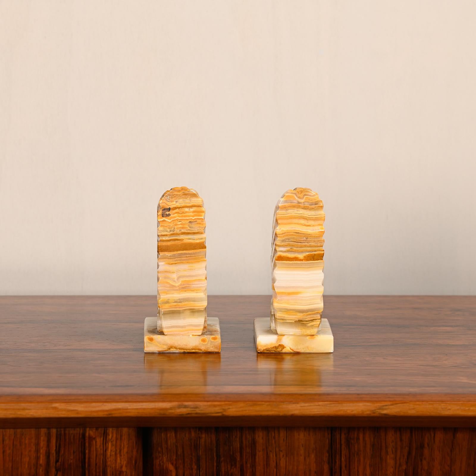 20th Century Art Deco marble bookends with carved heads of Native Americans