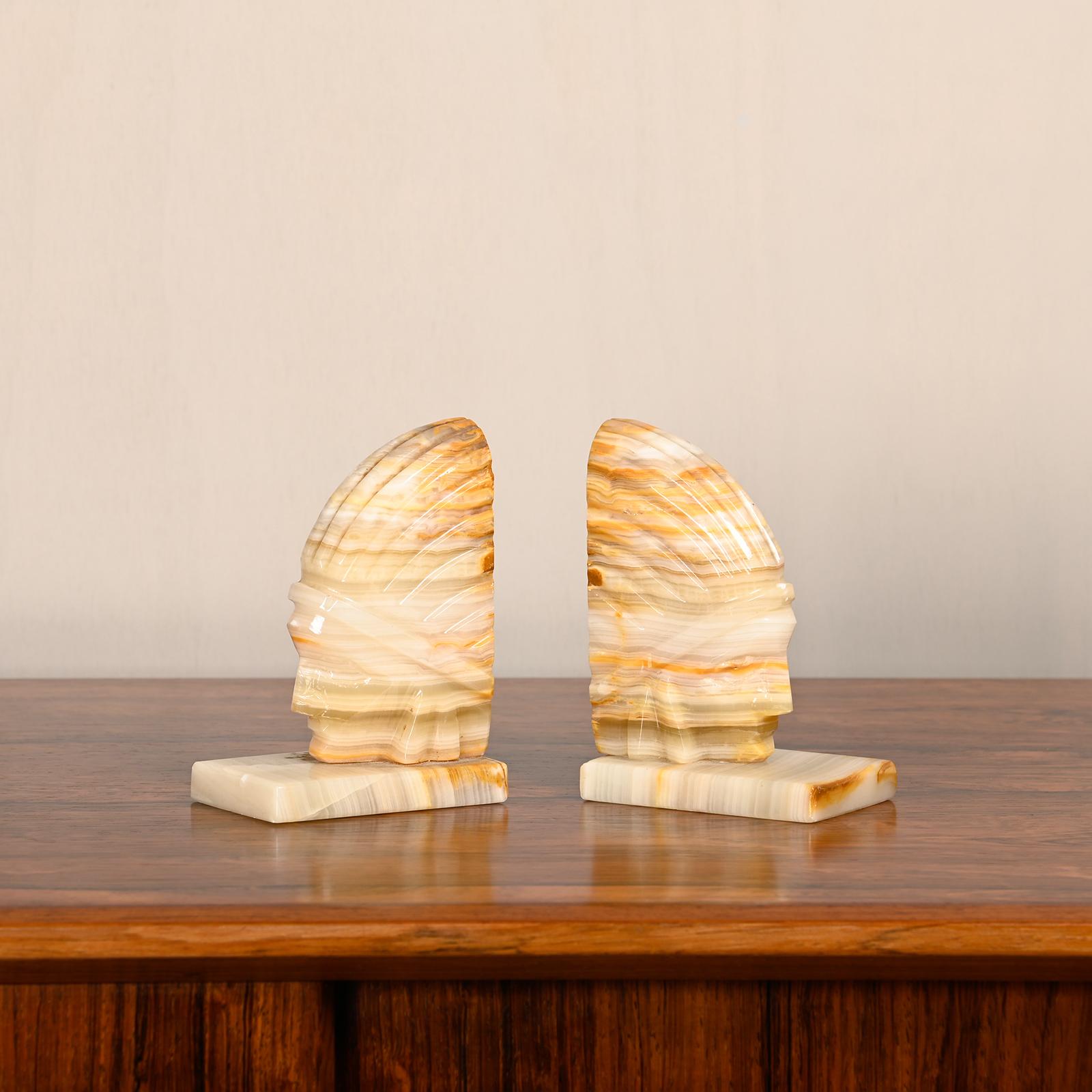 Marble Art Deco marble bookends with carved heads of Native Americans