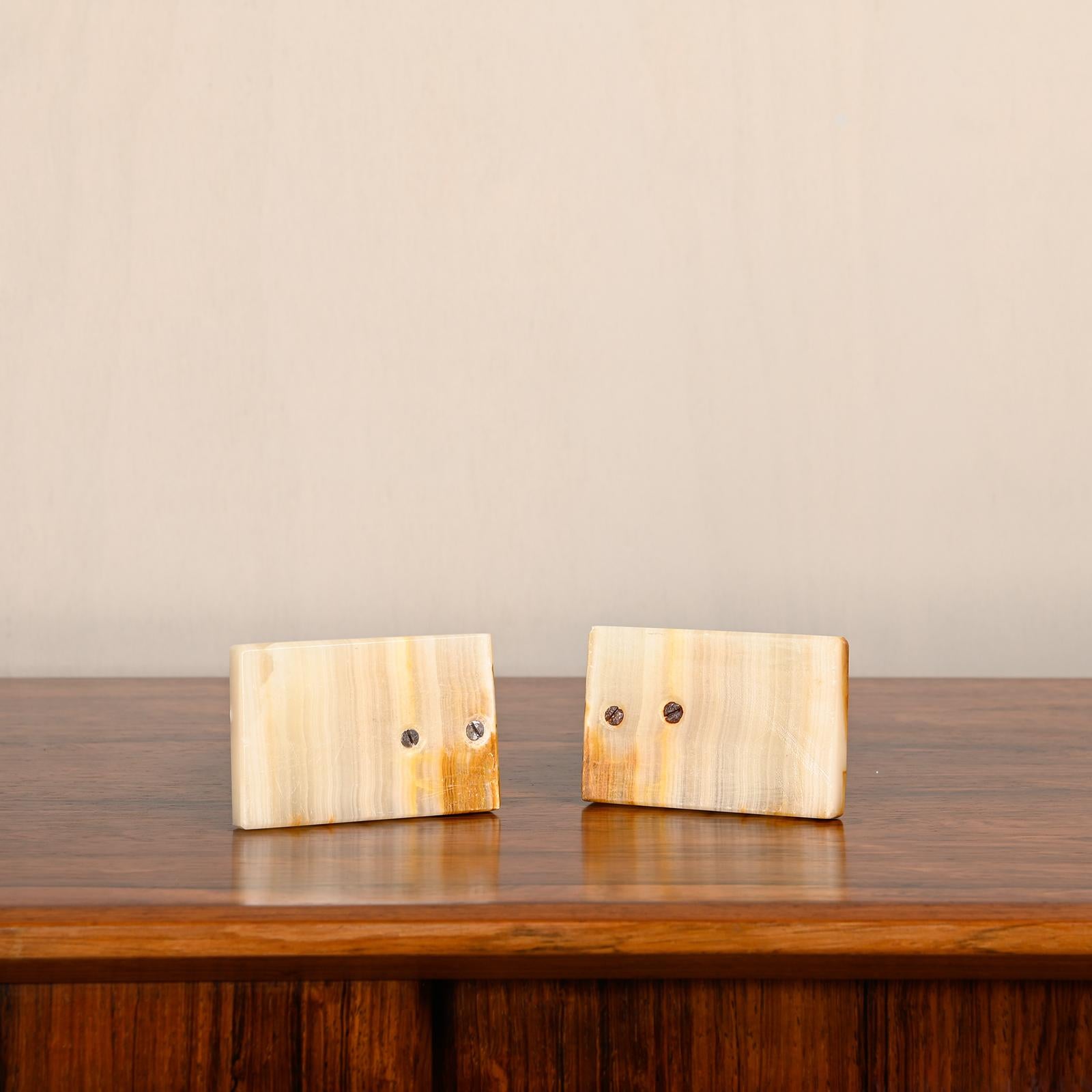 Art Deco marble bookends with carved heads of Native Americans 2
