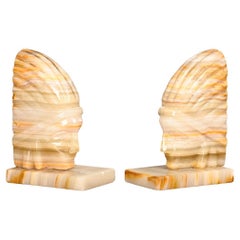 Art Deco marble bookends with carved heads of Native Americans