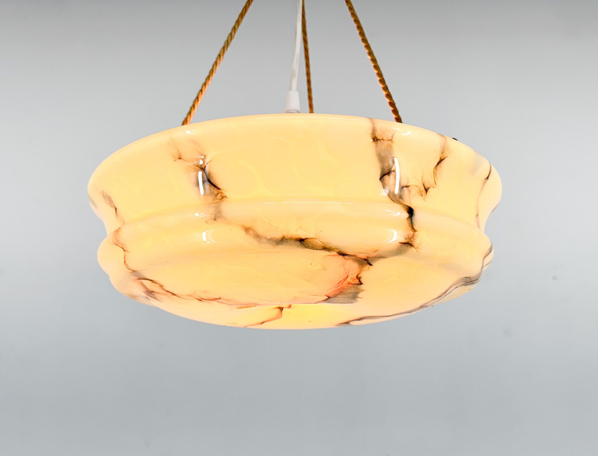 Art deco marble glass pendant light made in former Czechoslovakia in the 1930's. 
New wiring. 
Bulb: 1 x E 26 / E 27. 
US wiring compatible.