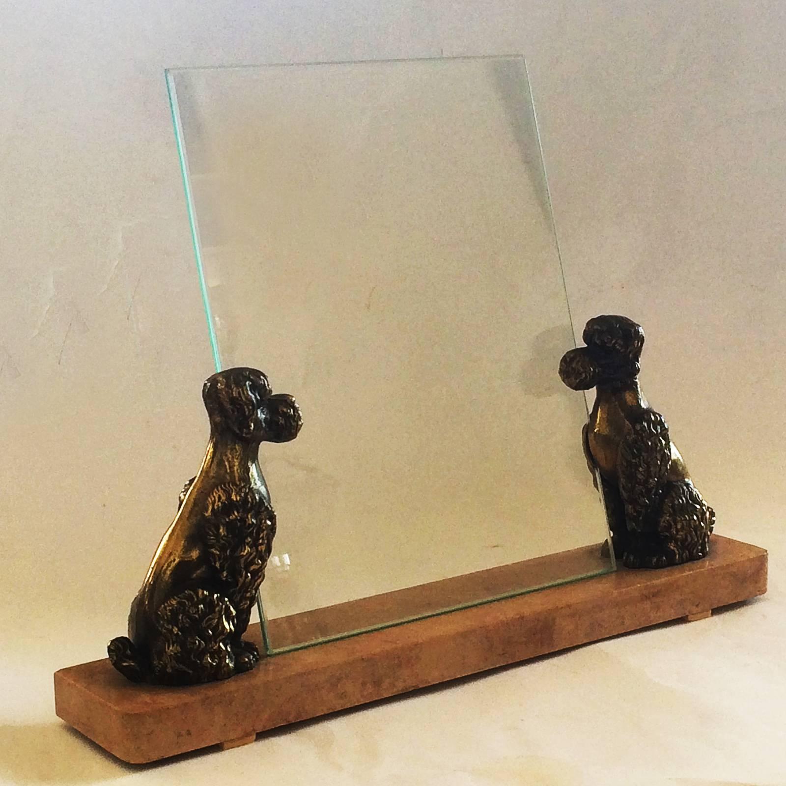 Art Deco photo frame, a pair of bronze, French poodles supporting the glass of the photo frame, sitting on a fantastic pink and cream variegated marble. All in excellent condition, with small curved edges to the front corners. A wonderful design,