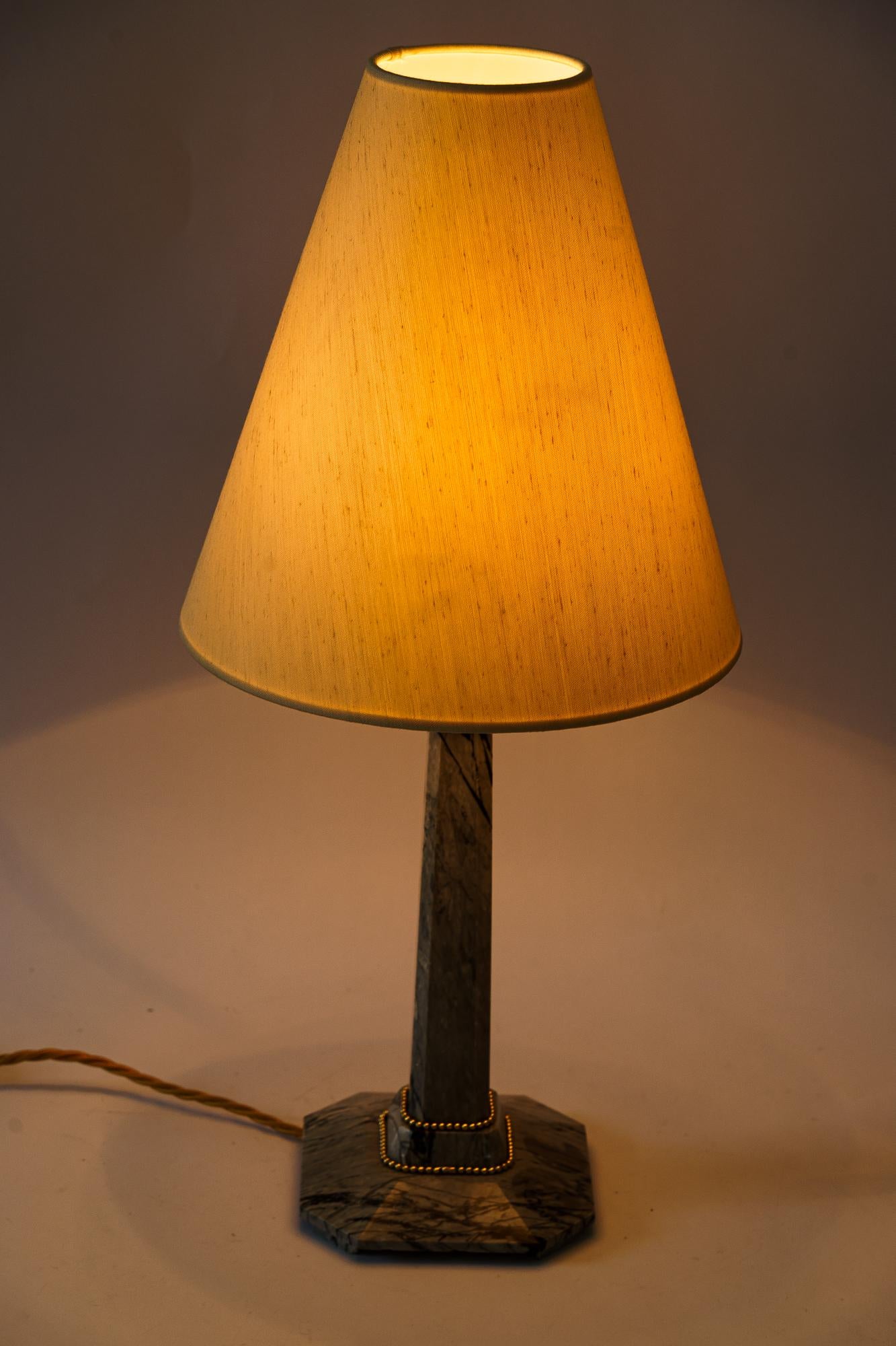 Early 20th Century Art Deco Marble Table lamp with brass parts and fabric shade vienna around 1920s For Sale