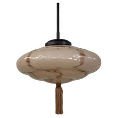 Art Deco Marbled Opaline Glass 
Bronzed Brass Pendant, Germany 1920s to 1930s