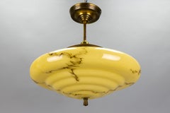 Art Deco Marbled Yellow and Brown Glass and Brass Pendant Light, 1930s