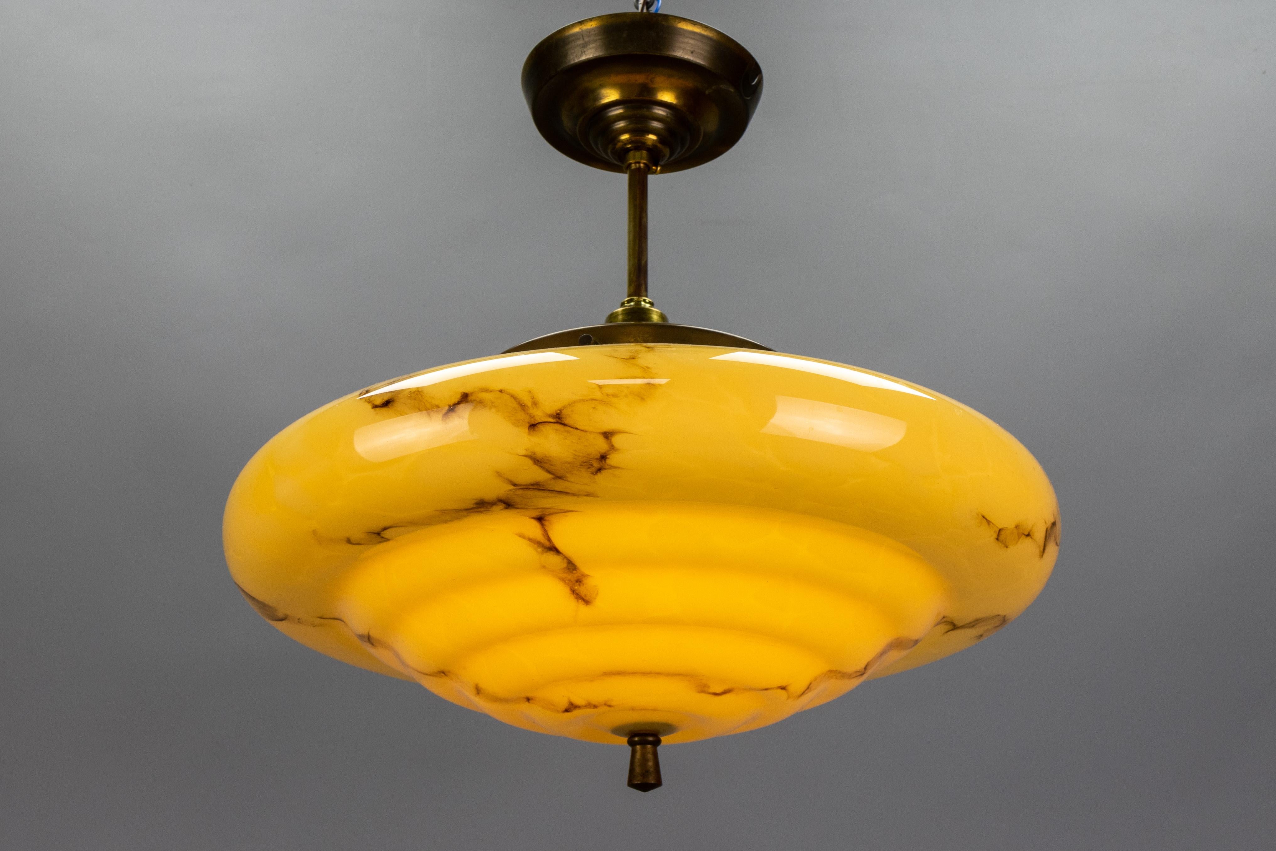 German Art Deco Marbled Yellow and Brown Glass and Brass Pendant Light, 1930s For Sale