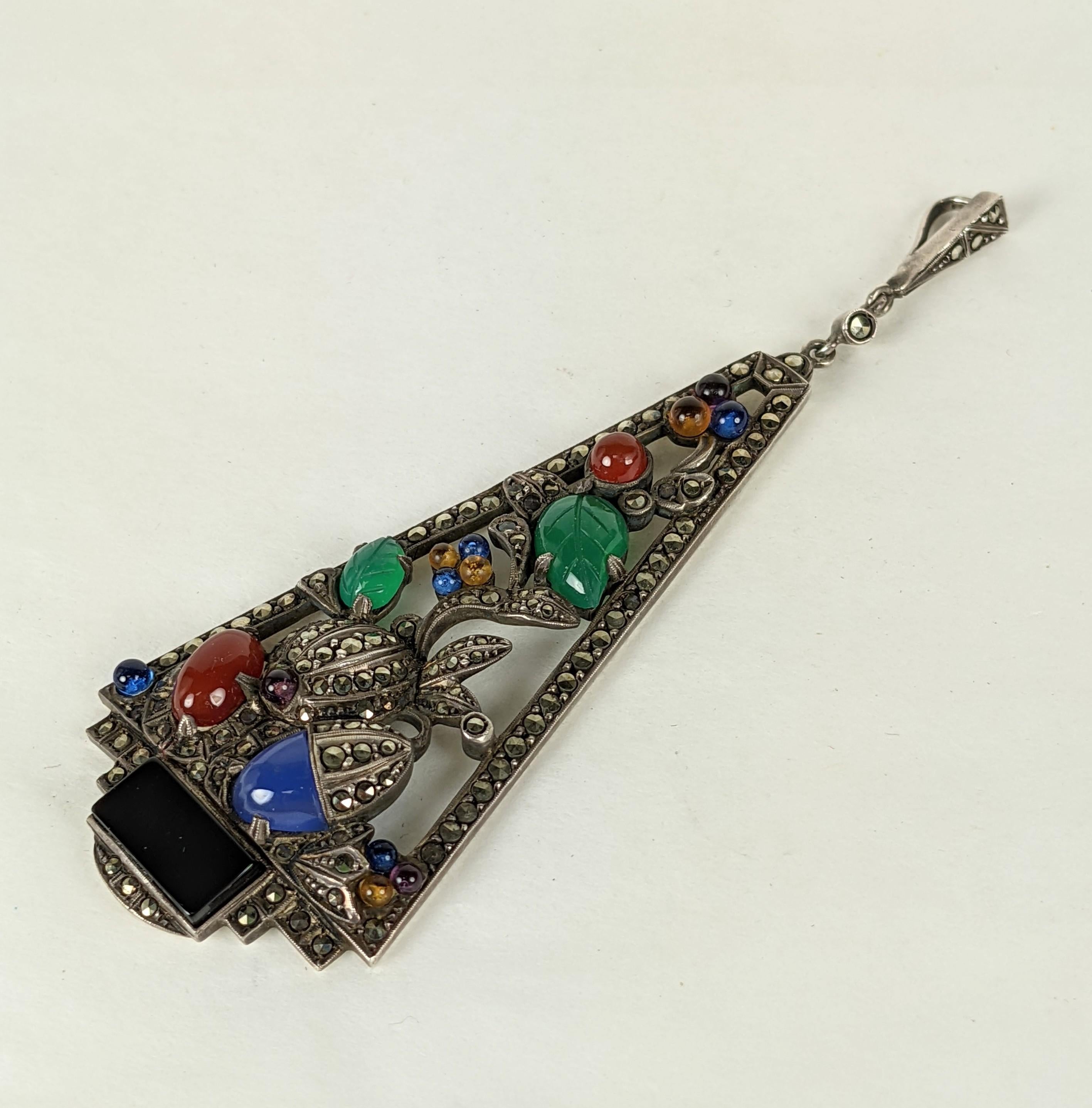 High Quality Art Deco Marcasite and Carved Stone Pendant in the Tutti Frutti style. Large scale pendant in sterling silver with carnelian, carved green onyx, chalcedony and onyx with pate de verre colored glass balls, all edged in marcasites.