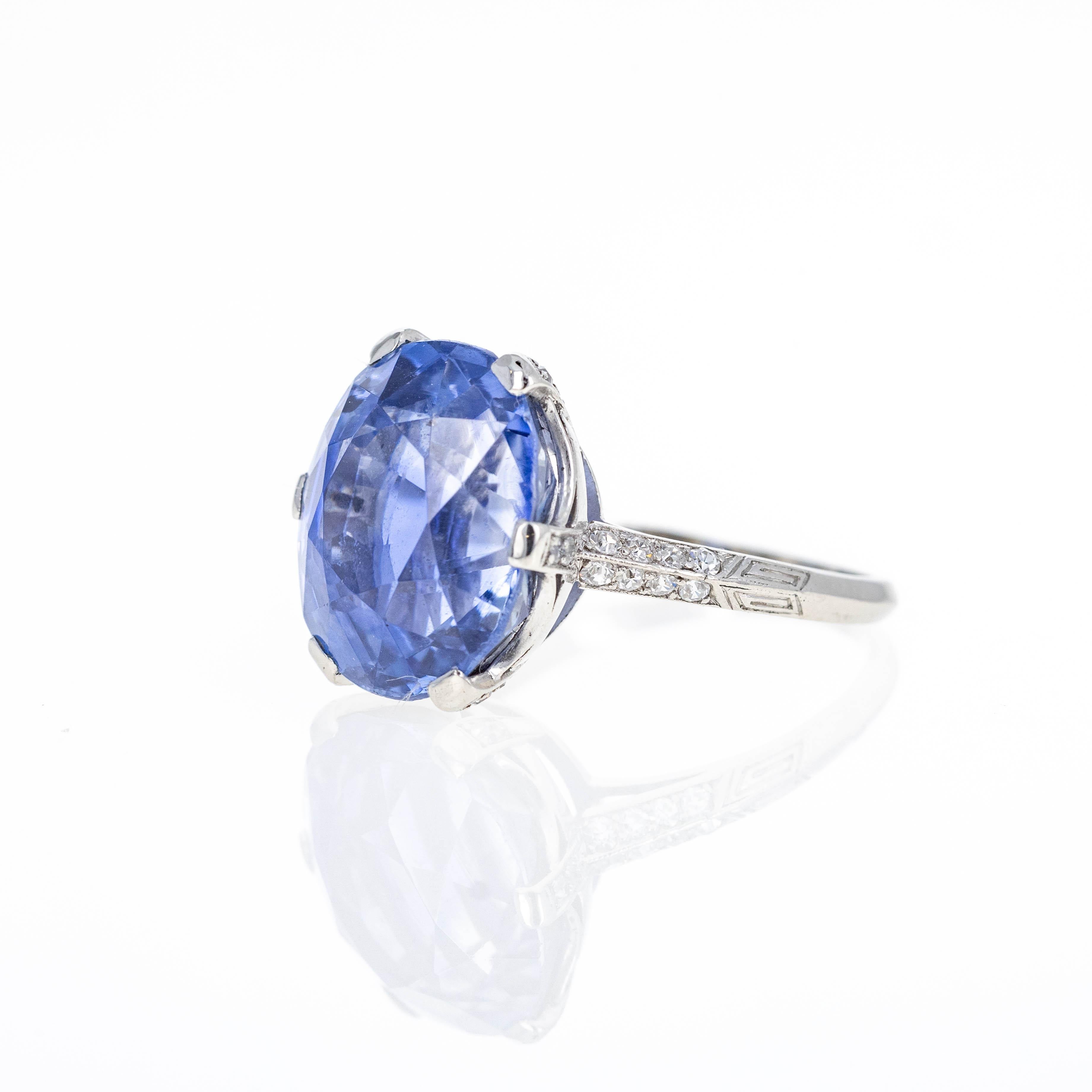 This rare Art Deco Marcus & Co. Platinum 12 Carat No Heat Sapphire Diamond Ring is a true masterpiece that combines timeless elegance with exceptional craftsmanship. Created by the renowned jewelry house Marcus & Co., known for its innovative