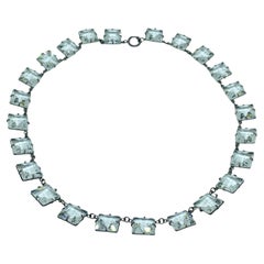 Collier en argent sterling marqué ART DECO et serti de verre facetté