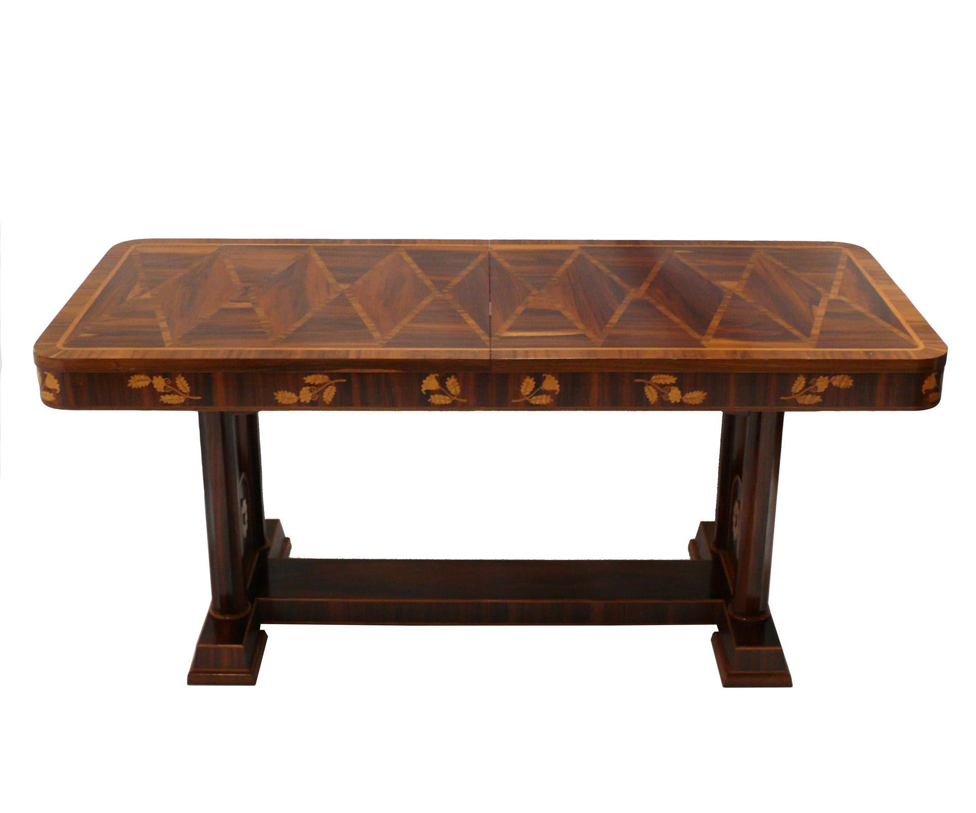 Art Deco marquetry dining or library table, Italian, circa 1930s. This piece is a versatile size and can be used as a dining table, library table, desk, bar, or console table.