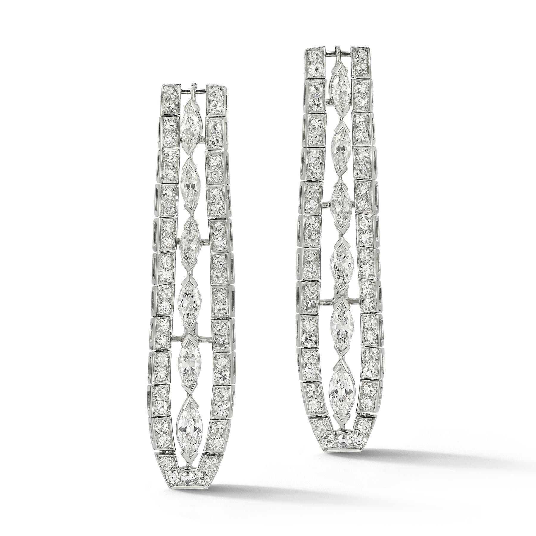 Art Deco Marquise Diamond Earrings 

Diamond Weight: approximately 7.00 cts 

12 marquise cut diamonds surrounded by 98 round cut diamonds set in platinum.

Back Type: Push Back

Measurements: 2.05