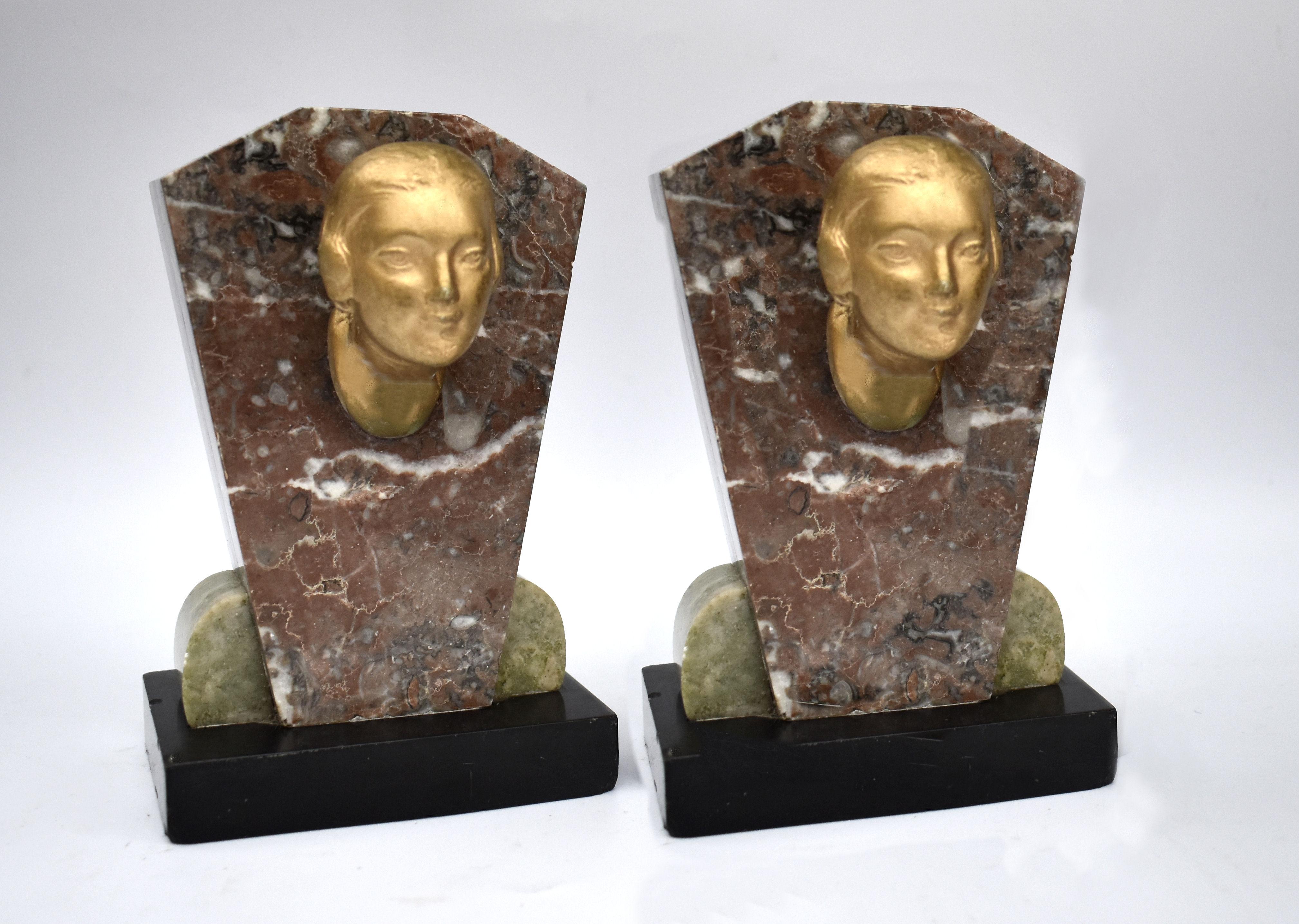 For your consideration are these very attractive matching Art Deco bookends which date to the 1930s. Originating from France the figures are made from plaster and sit on solid tri coloured marble backs/ plinths. The bookends are quite tall and