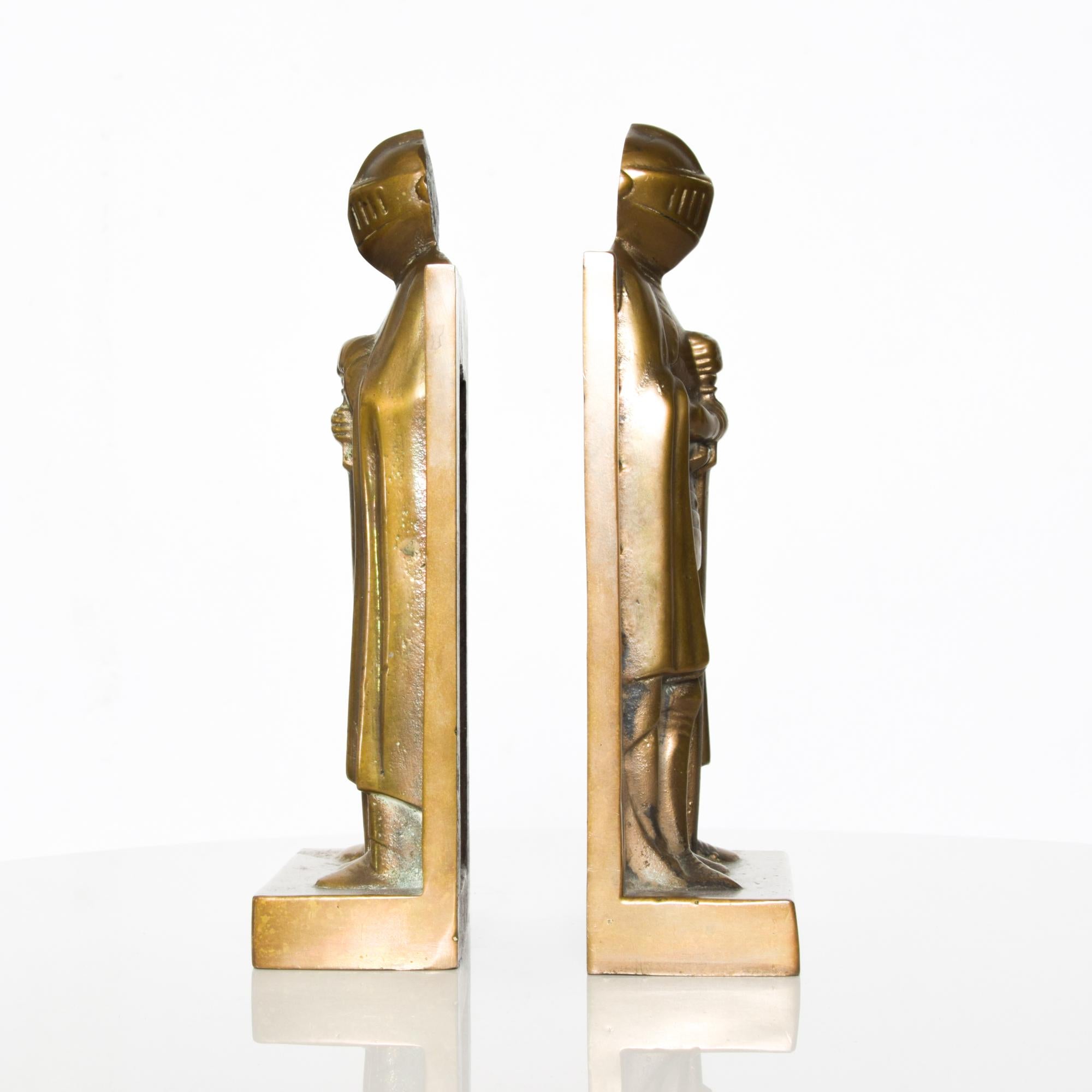 Vintage pair of heavy solid bronze sculptural medieval robed and cloaked knights bookend pair in shining armor Art Deco
Measures: 9 H x 4.75 W x 2 D
Original unrestored vintage presentation and condition. See images provided.


  