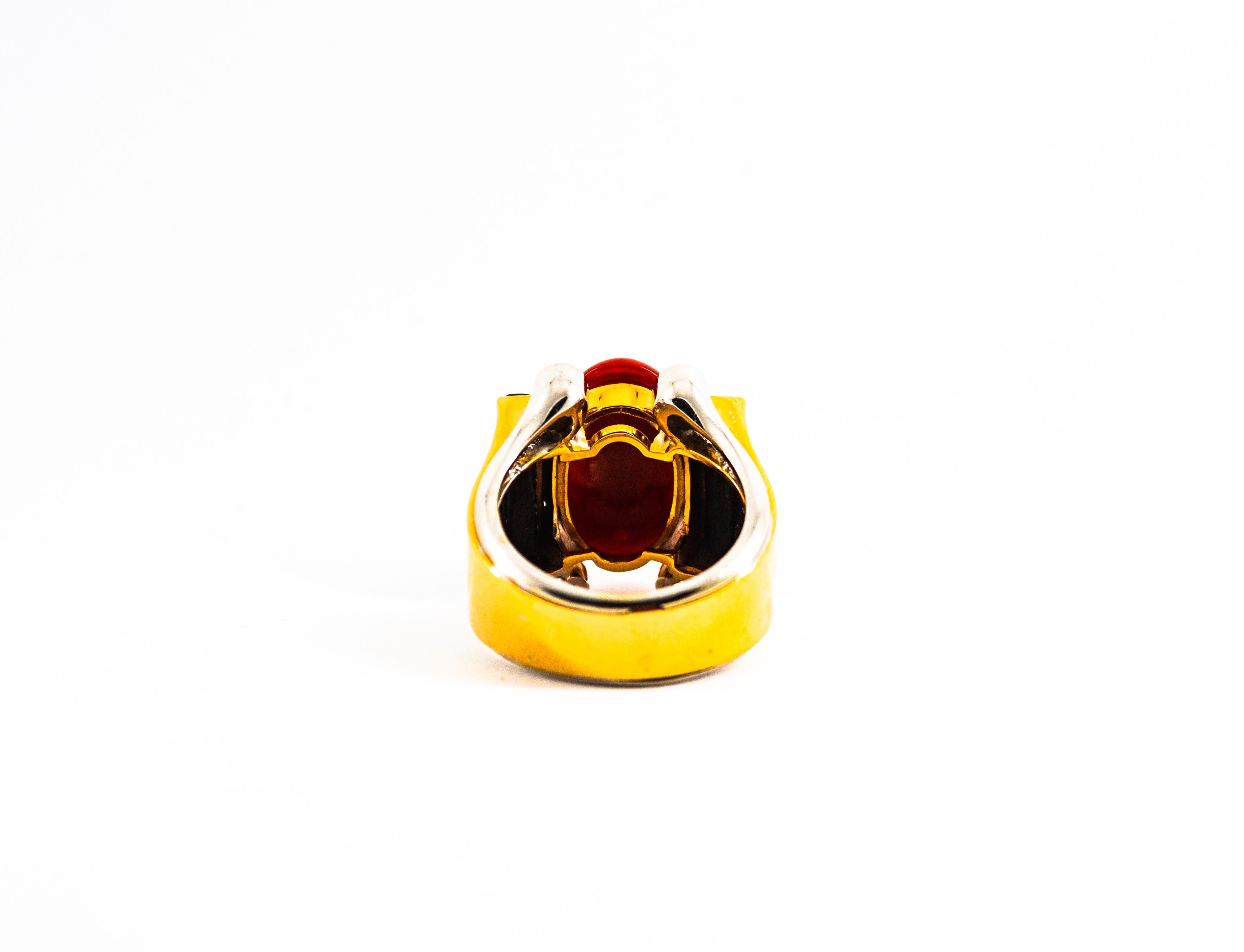 This Ring is made of 14K Yellow Gold.
This Ring has 0.30 Carats of White Moder Round Cut Diamonds.
This Ring has Onyx and Mediterranean (Sardinia, Italy) Red Coral.
Size ITA: 15 USA: 7
We're a workshop so every piece is handmade, customizable and