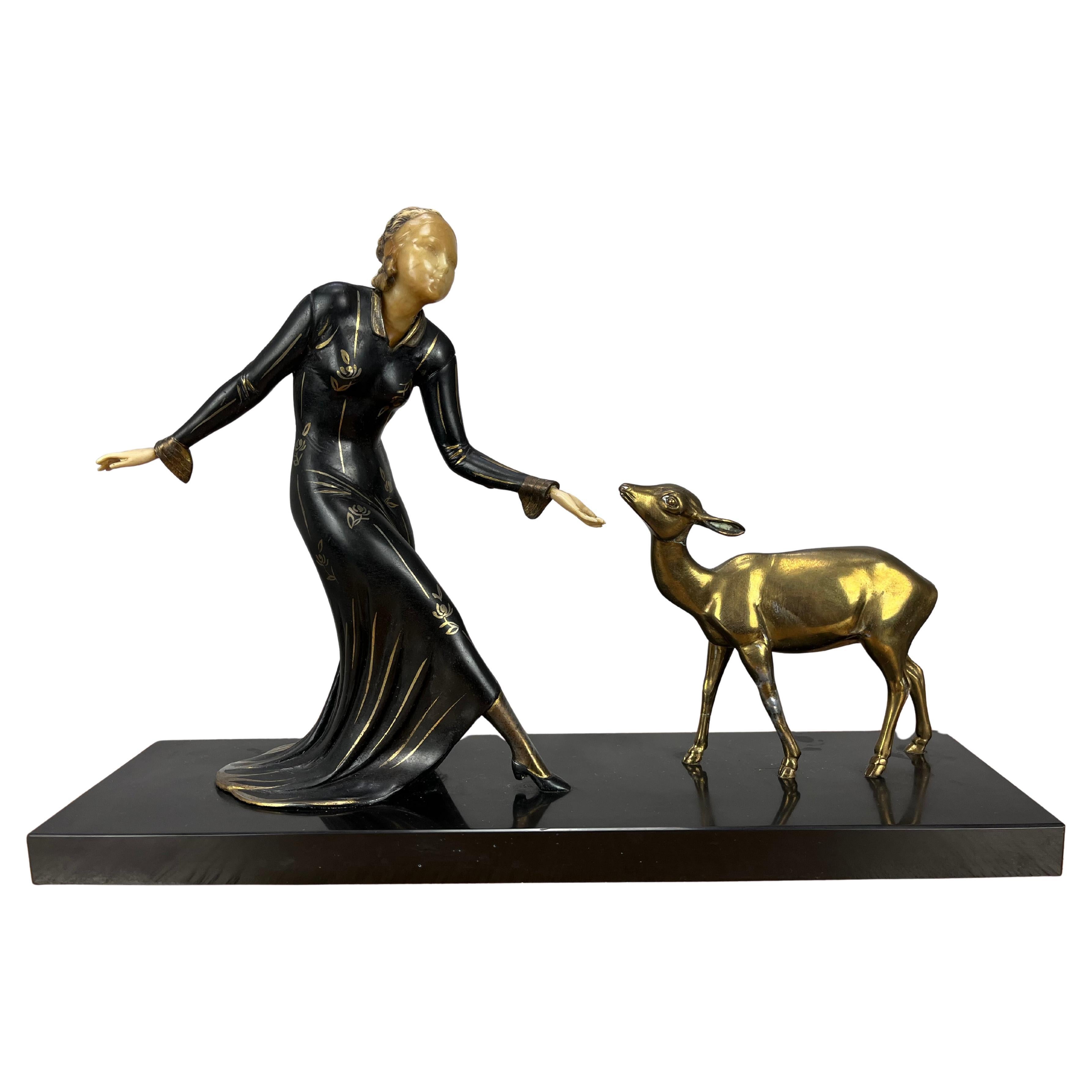 Art Deco Menneville sculpture, woman and fawn, 1930's For Sale