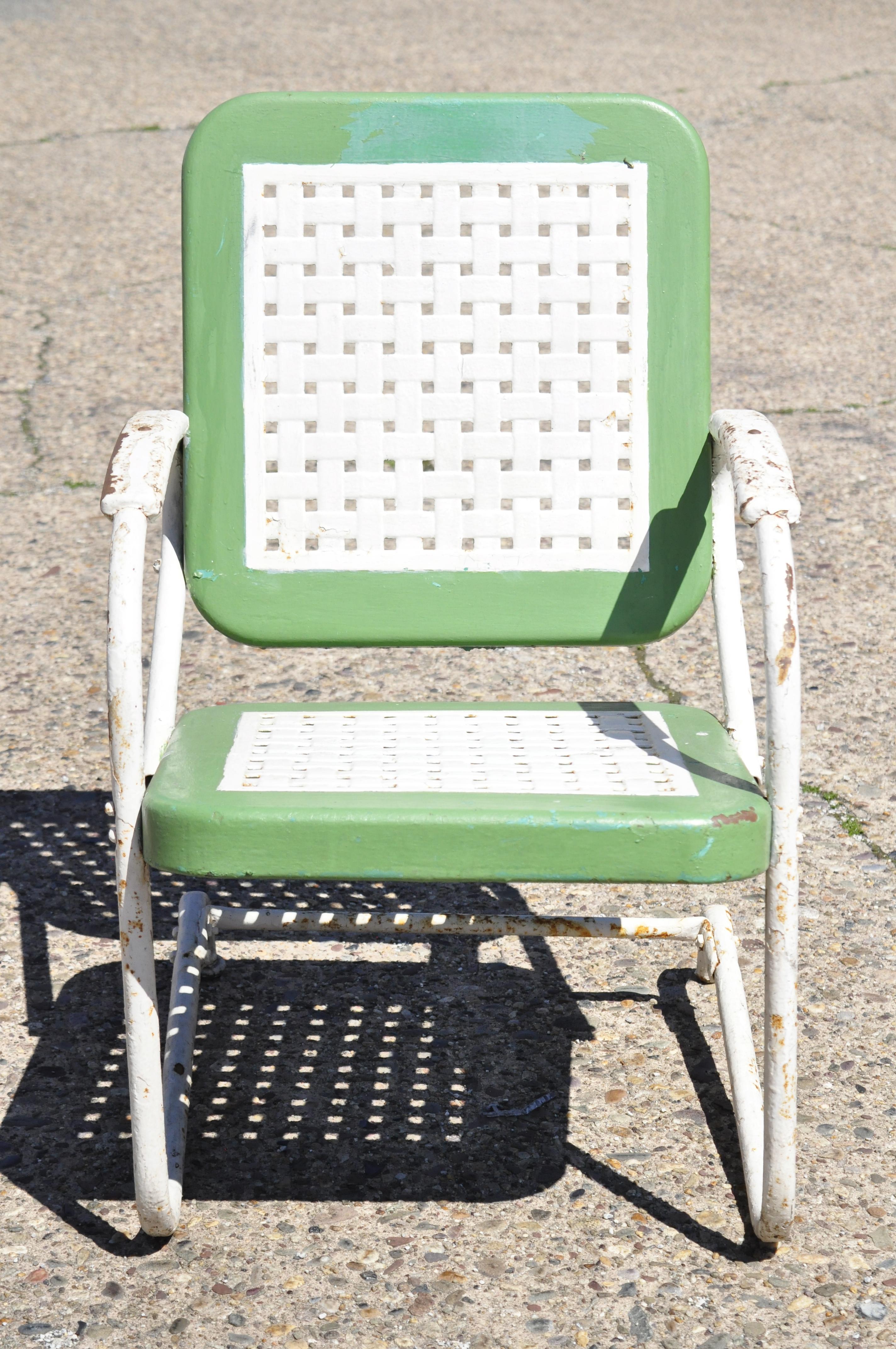 Vintage Art Deco metal basketweave old green white porch outdoor spring arm chair. Item features original green and white painted finish, woven basket weave seat and back, metal frame, very nice antique chairs, quality American craftsmanship, great