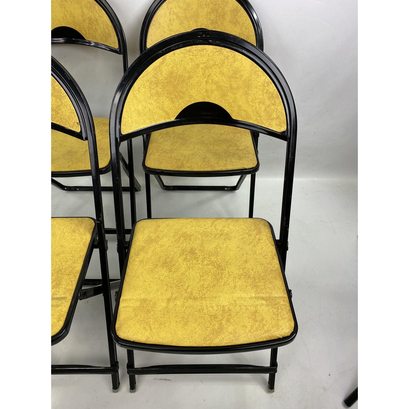 yellow metal folding chairs
