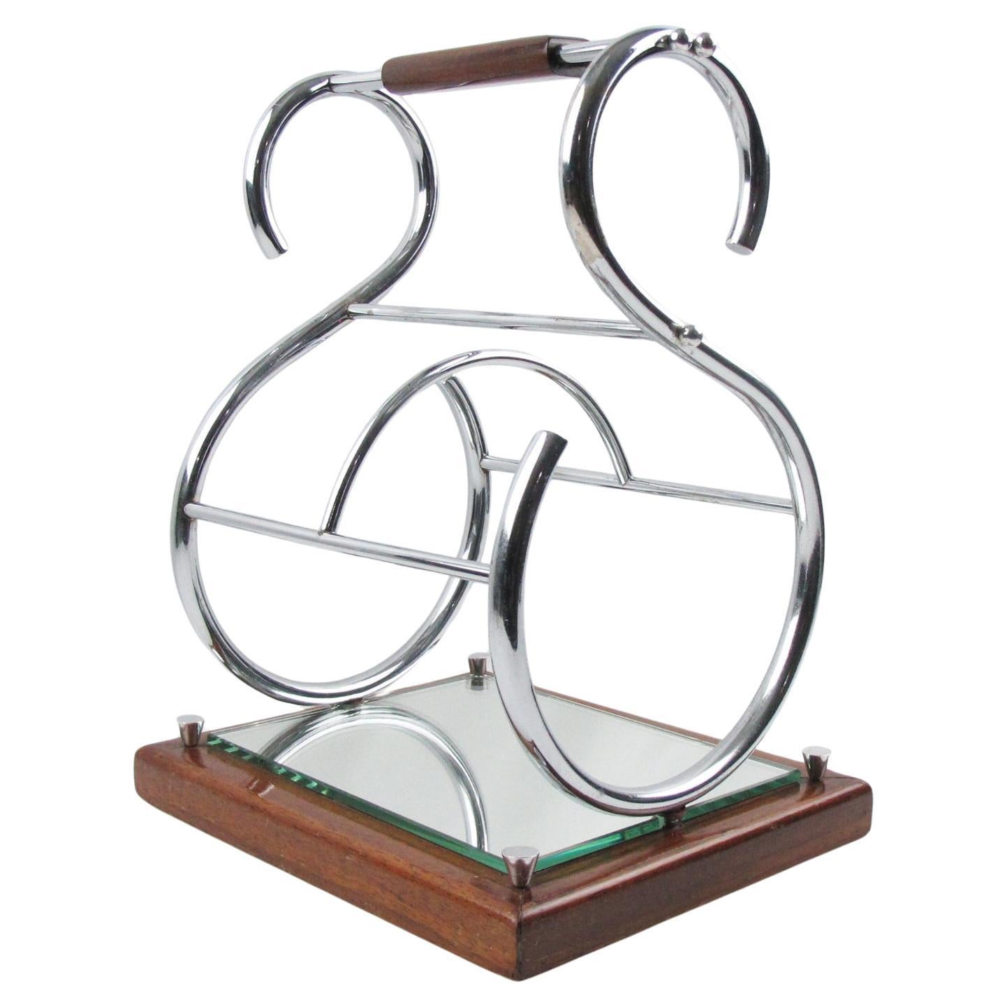 Este elegante portabotellas, soporte o caddy modernista Art Decó tiene una escultural forma geométrica de 