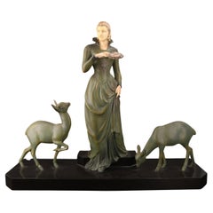 Art Deco metal sculpture "The Lady With Deer" by Menneville (Ugo Cipriani)