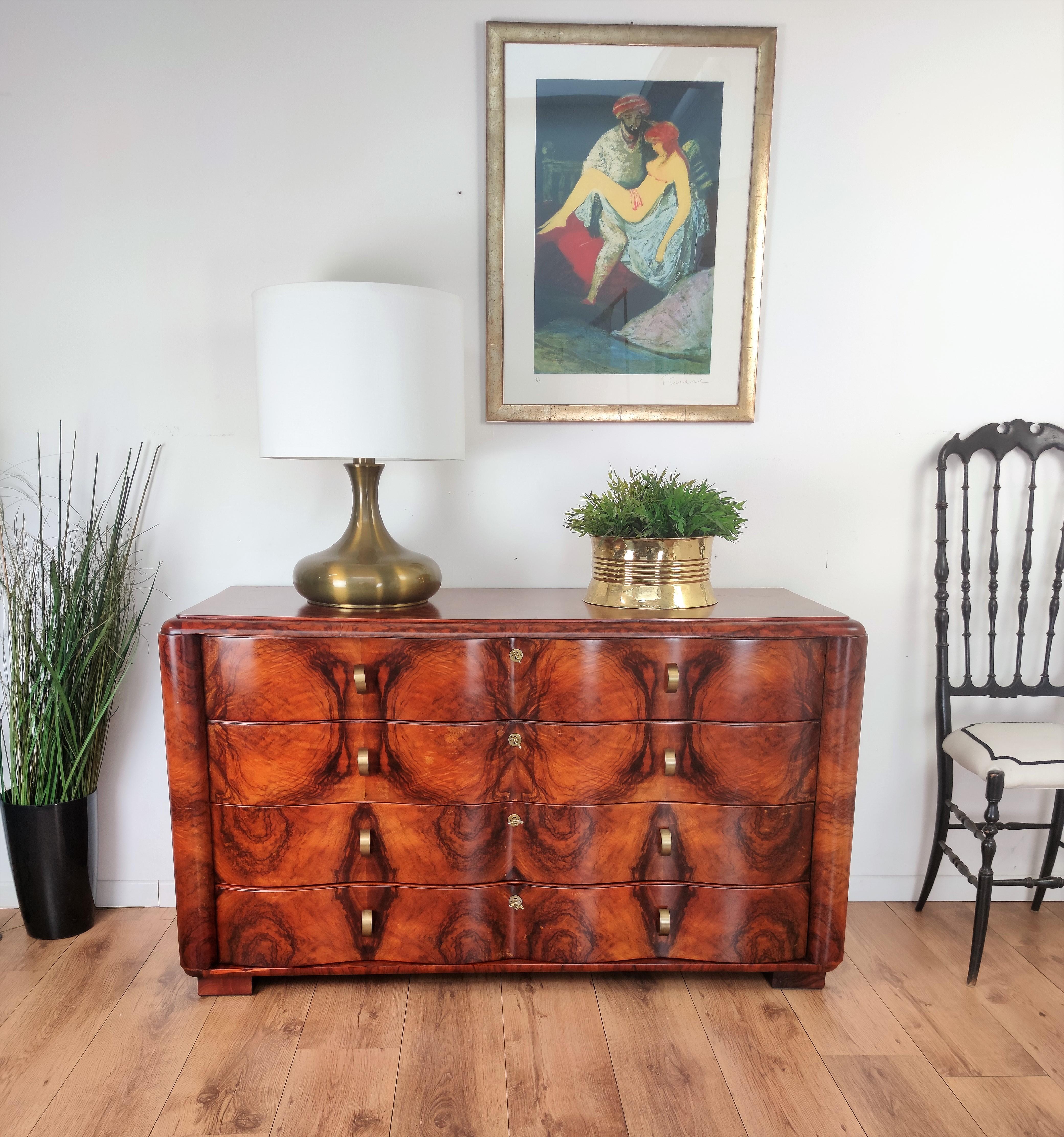 Very elegant Italian Italian mid-century Art Deco style chest of drawers, in beautiful veneer walnut briar burl wood with great shaped front and four drawers. The Art Deco style is all about making a big statement and was considered very glamorous,