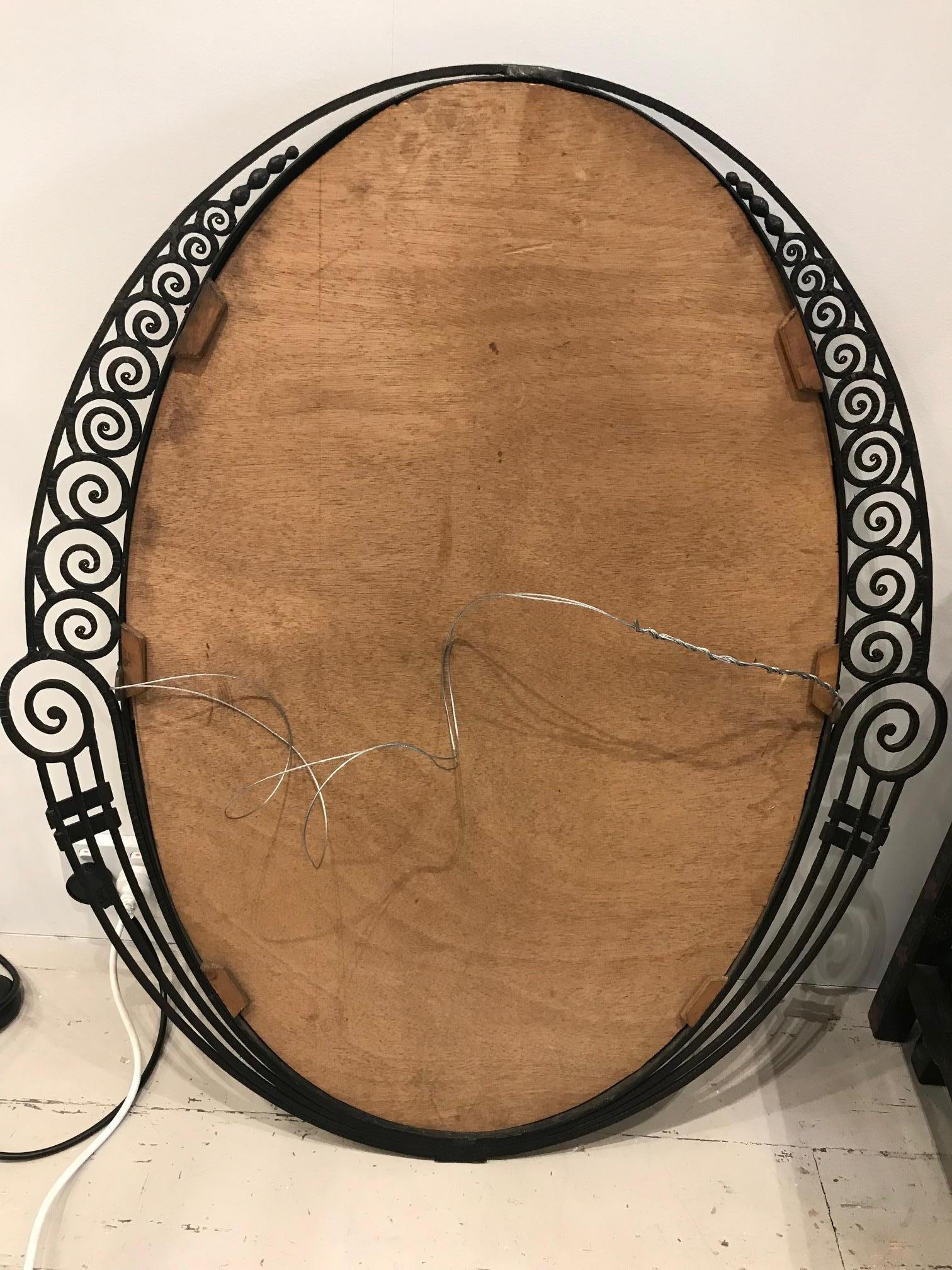 Wrought Iron Art Deco Mirror and Serpentine Marble Demilune Console, Style of Edgar Brandt For Sale