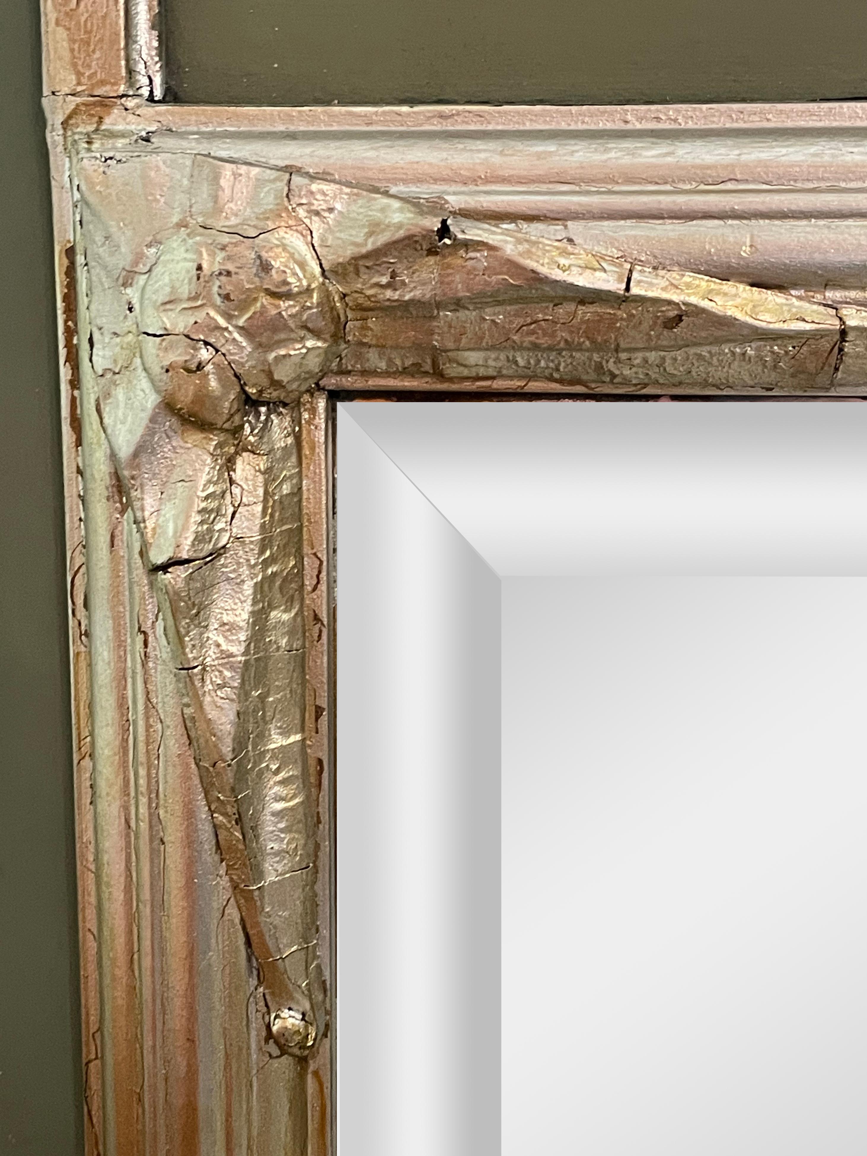 Art Deco mirror
This elegant Art Deco mirror originates from France and was made around 1930. The original faceted mirror glass adds authenticity and historical value to the piece. A wooden frame is finished in a stylish grey-green setting that adds