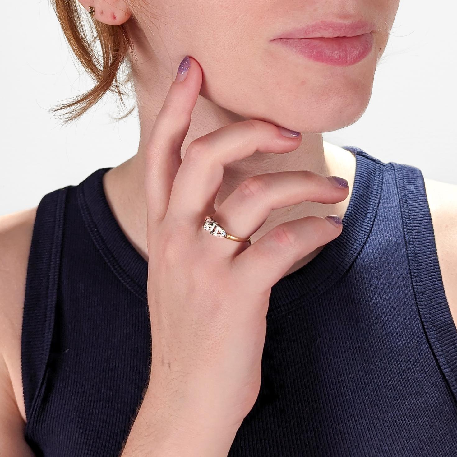 A very fine Art Deco engagement ring.

In an illusion setting. 

With a small, single diamond prong set in a 14k white gold bridge supported by an 18k yellow gold shank.

Simply a wonderful illusion-set, mixed-metals Deco ring!

Date:
Early 20th