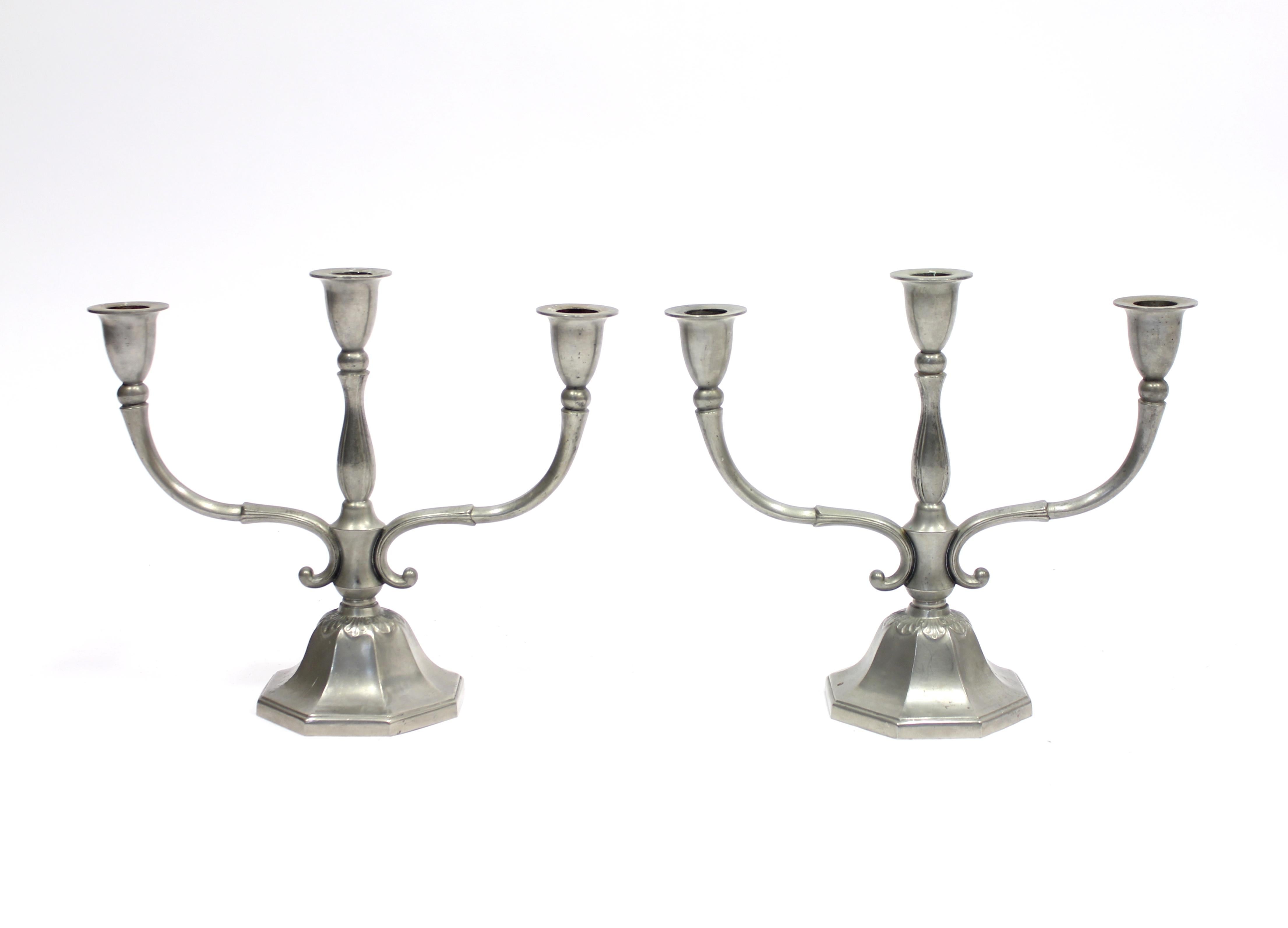 Pair of tin Art Deco candleholders, model 1248, designed and manufactured by Danish designer Just Andersen. They take three candles each. Very Good vintage condition.