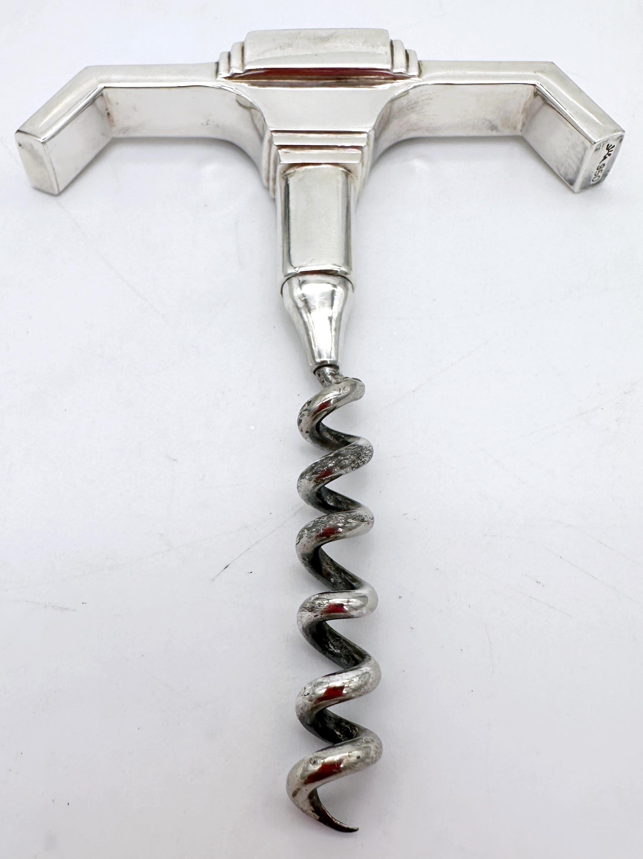 Streamlined Art Deco Sterling Silver (.950) & Silverplate Corkscrew with Monogram 'S', Circa 1930

Sleek, architectural, and substantial, this vintage corkscrew is a striking example of Art Deco design rendered in .950 sterling silver—an unusually