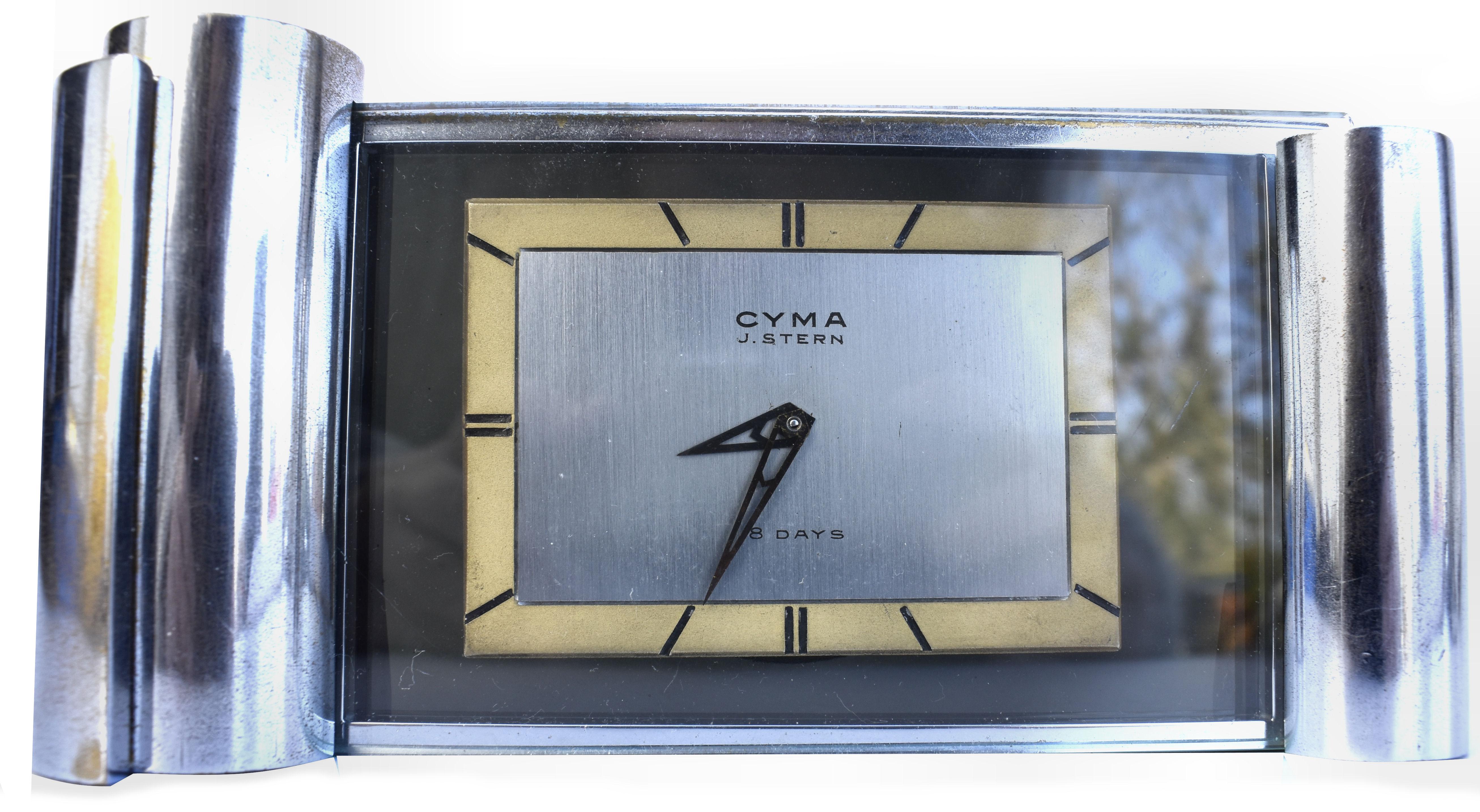 Impressive 1930s modernist clock by CYMA. Fully serviced by our horologist and in excellent working order, keeping good time. This really is a deceptively heavy clock with a solid brass case which is chromed, added with thick plate glass 1 cm thick.