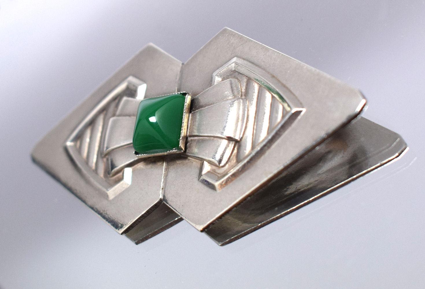 For your consideration is this very stylish Modernist Brooch by Jakob Bengel. Dating to the 1930's this is a very innovative and individual piece of jewellery, aesthetically characterised by the lightness in the design. Silvered Metal with green