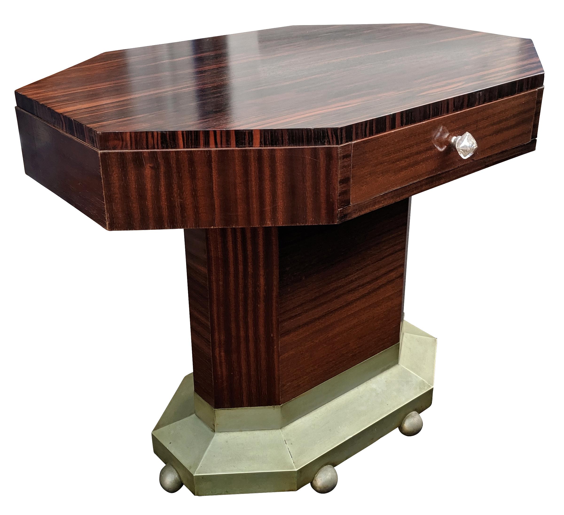 For your consideration is this wonderfully stylish modernist centre table is the luxury woods of ebony Macassar which dates to the 1930s. There is a central drawer which is connected either side adding more functionality than just your regular