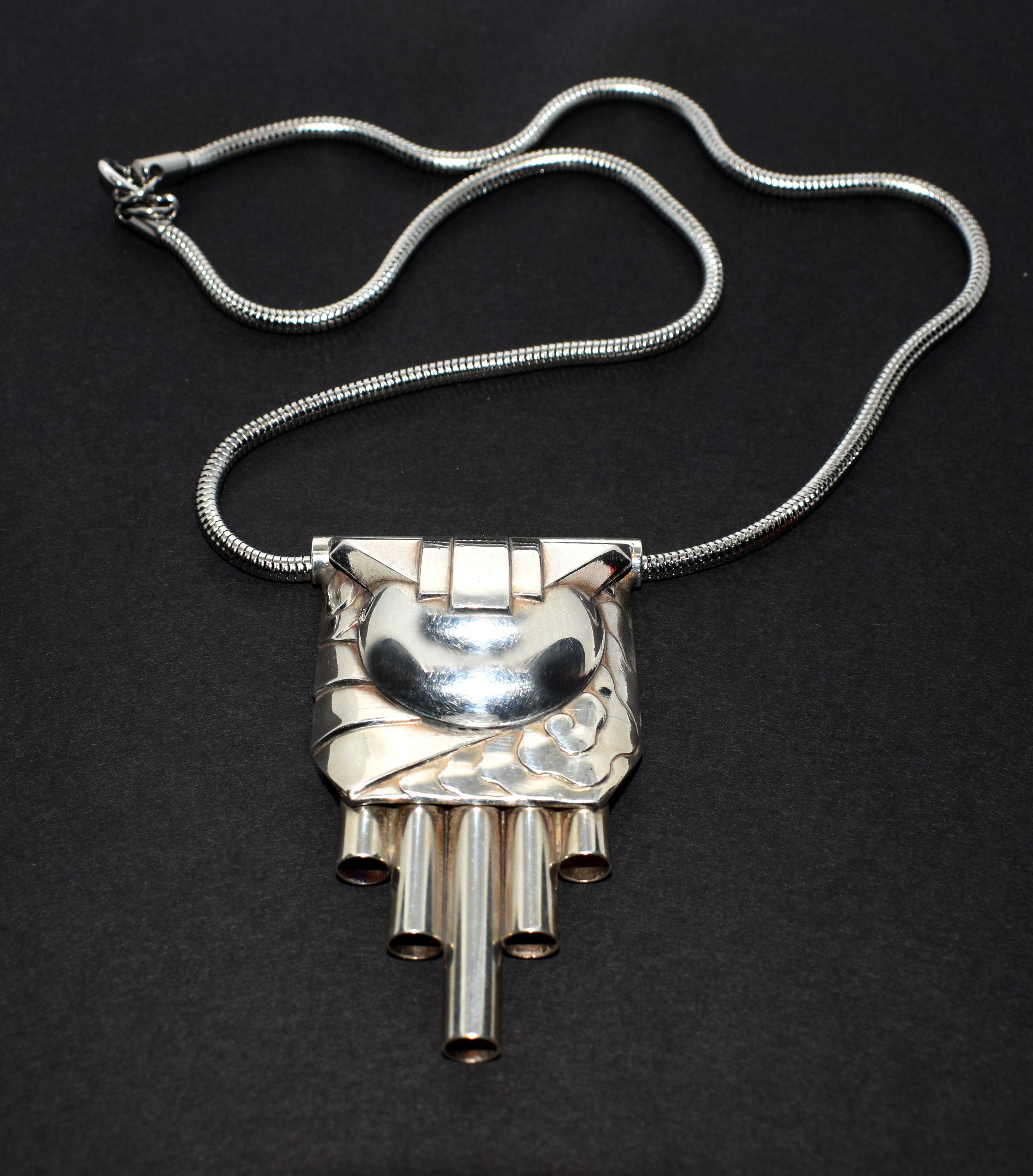 Fabulous Modernist statement necklace circa 1930's. Features a central pendant in the form of layered geometric form in nickled chrome finish on mixed metal. Extremely stylish piece of jewellery from the  1930's and so advanced for it's time in it's