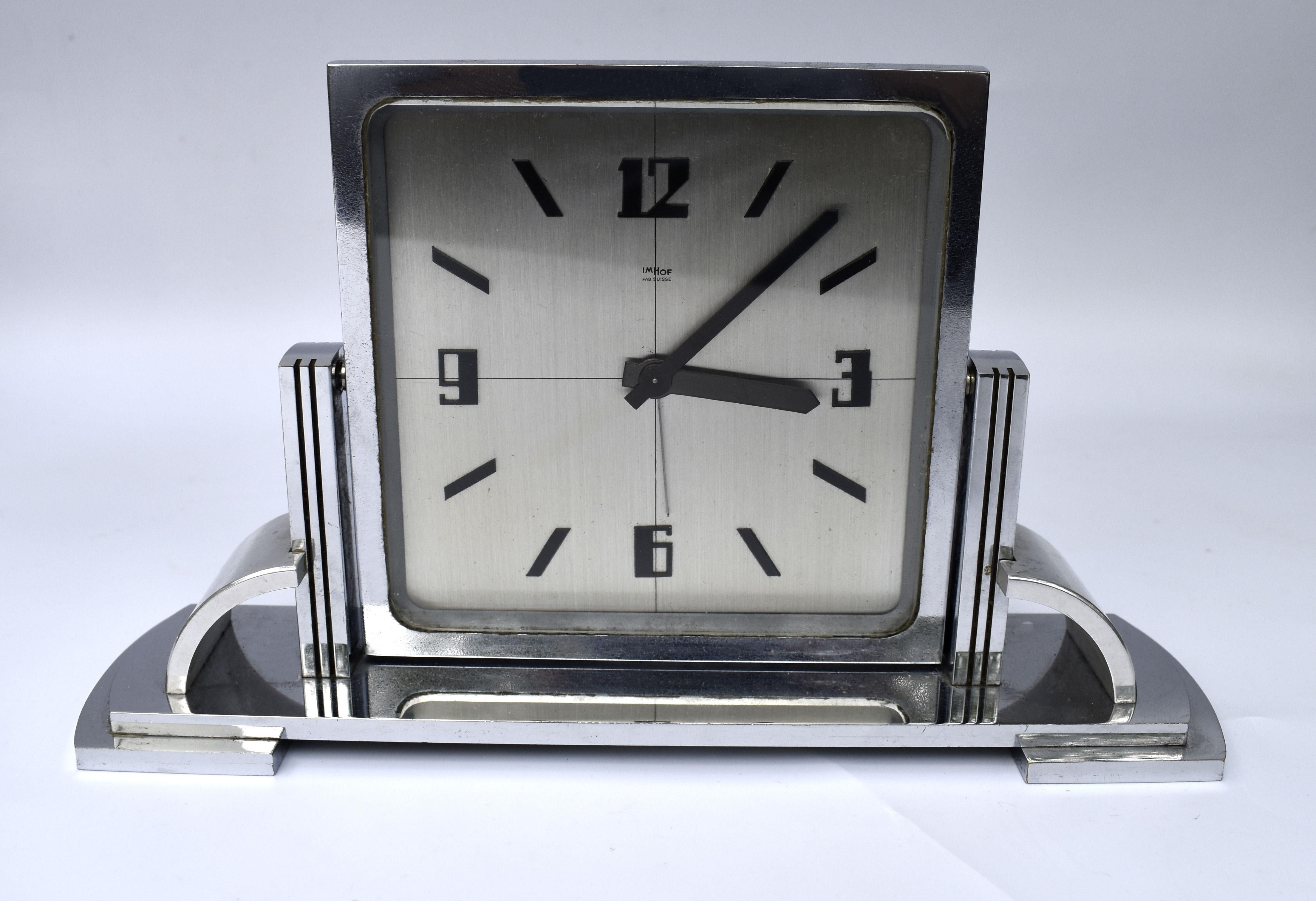 Wonderful quality Swiss Art Deco clock from the house of Imhof in Switzerland, dating to the 1930's. Chromed bronze case, showing some ware but nothing too unsightly. Superb styling and good size for desk or mantle area. We've had this clock